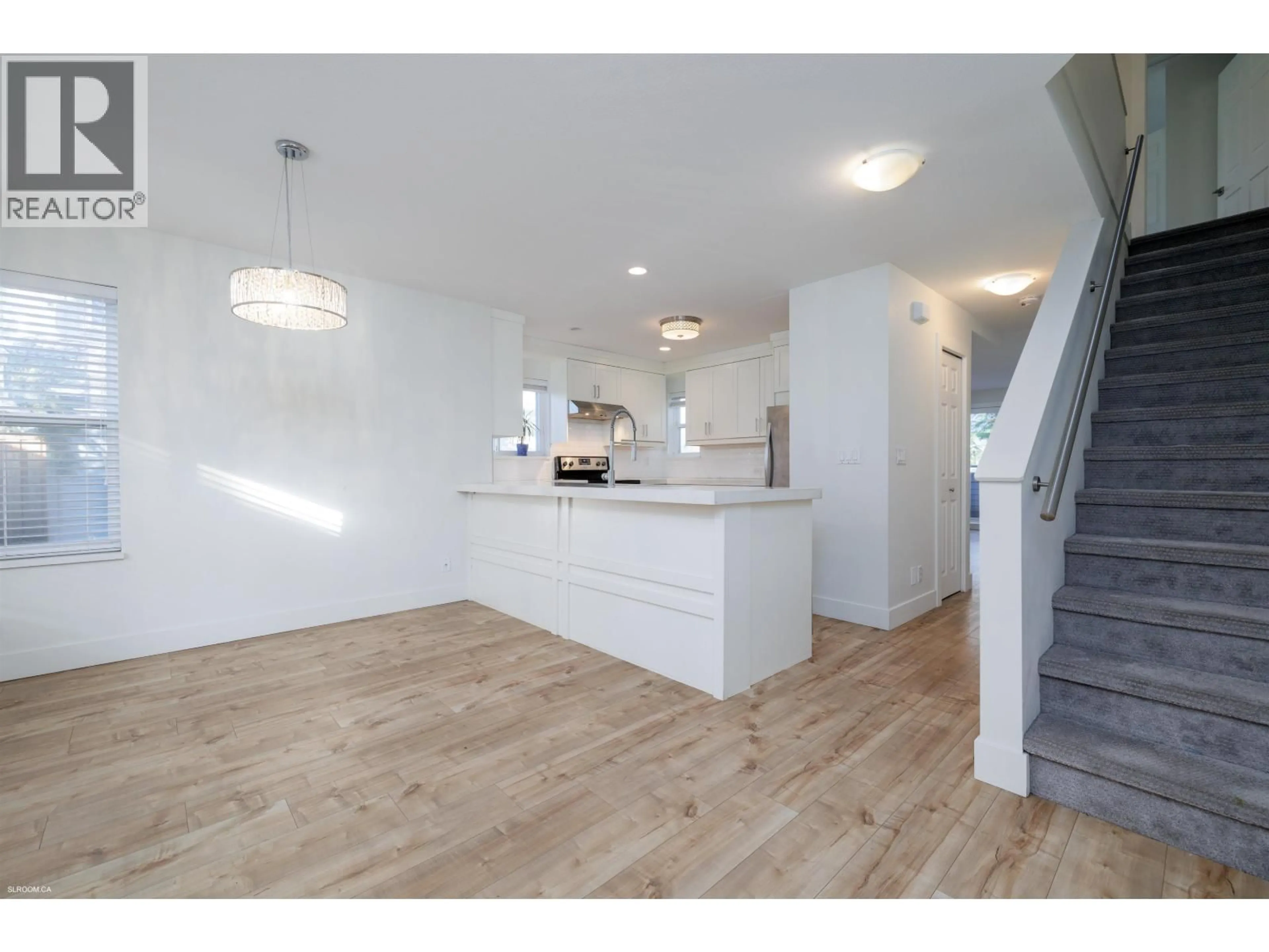 Open concept kitchen, wood/laminate floor for 140 SHORELINE CIRCLE, Port Moody British Columbia V3H5B3