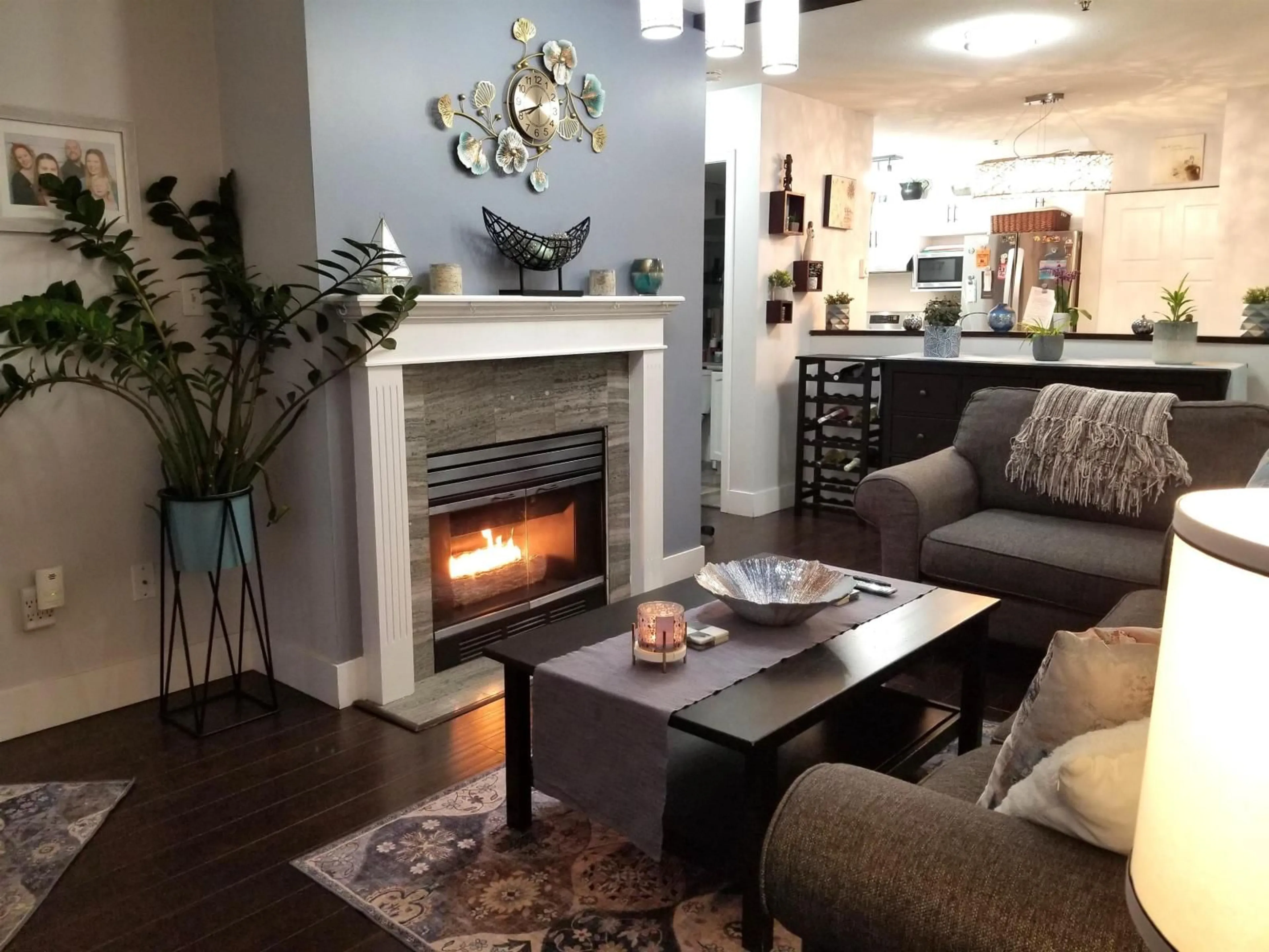 Living room with furniture, wood/laminate floor for 208 - 2964 TRETHEWEY STREET, Abbotsford British Columbia V2T6P4