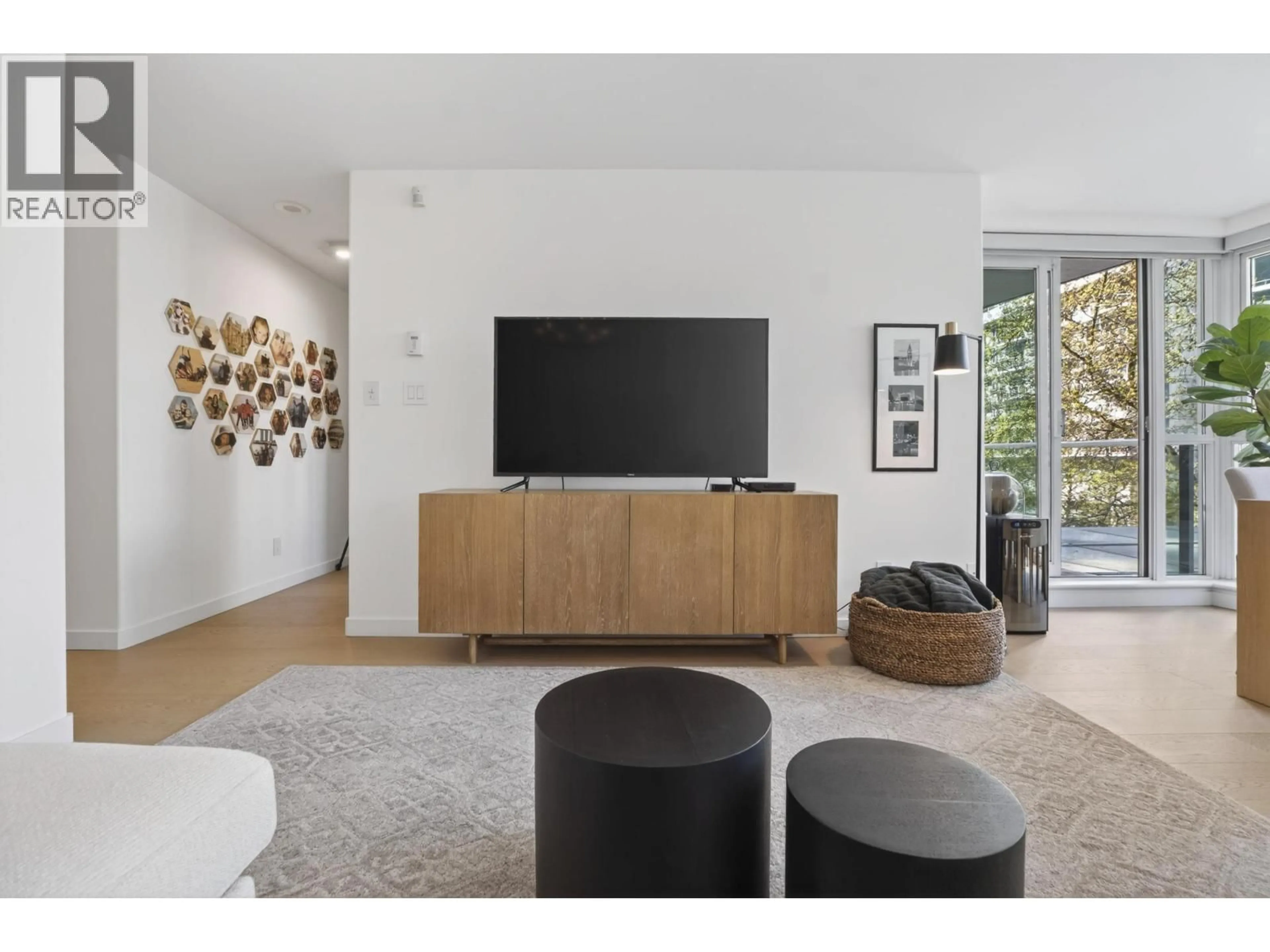 Living room with furniture, wood/laminate floor for 305 - 560 CARDERO STREET, Vancouver British Columbia V6G3E9