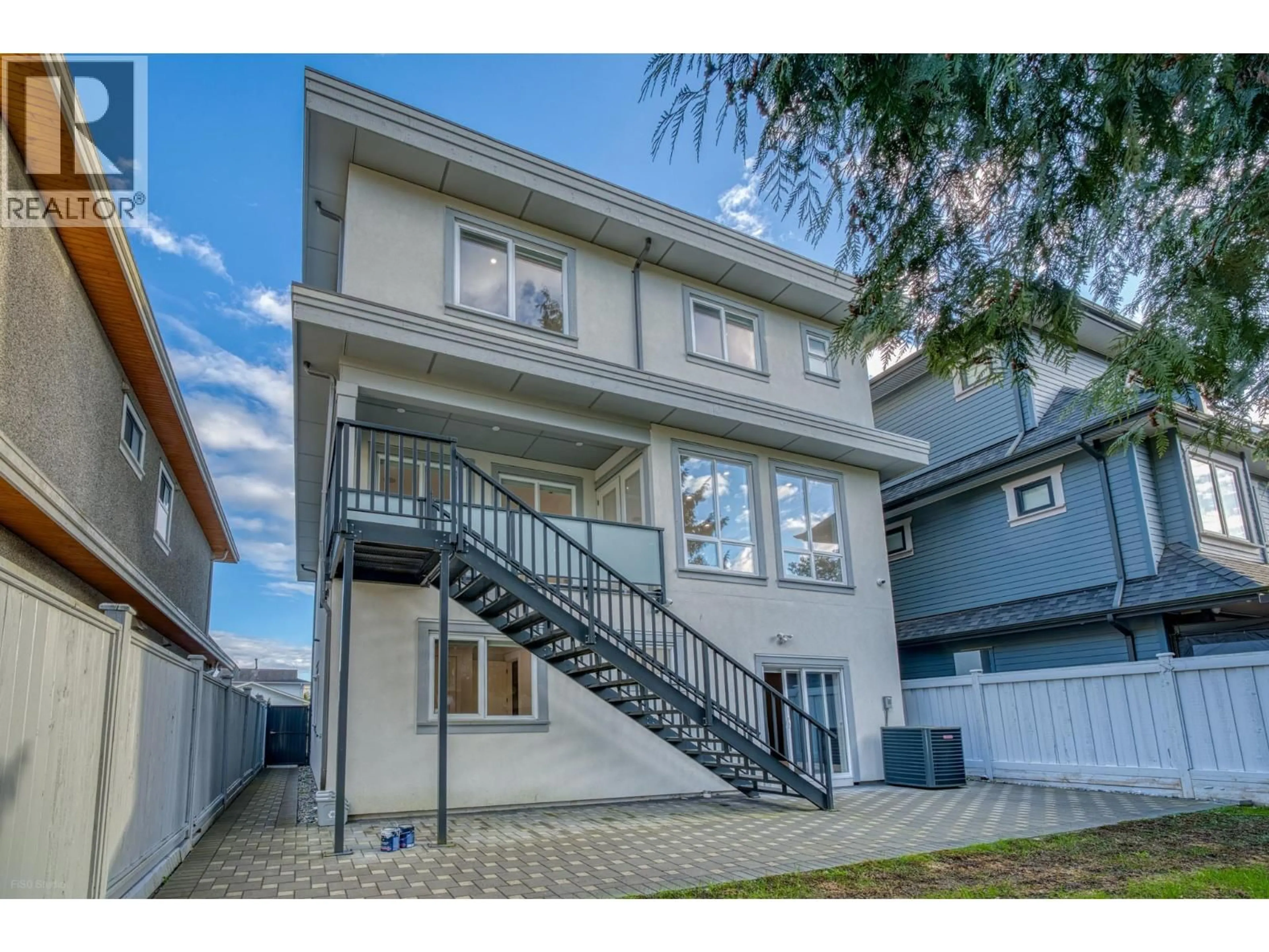 Home with vinyl exterior material, street for 4471 WINDJAMMER DRIVE, Richmond British Columbia V7E4L7