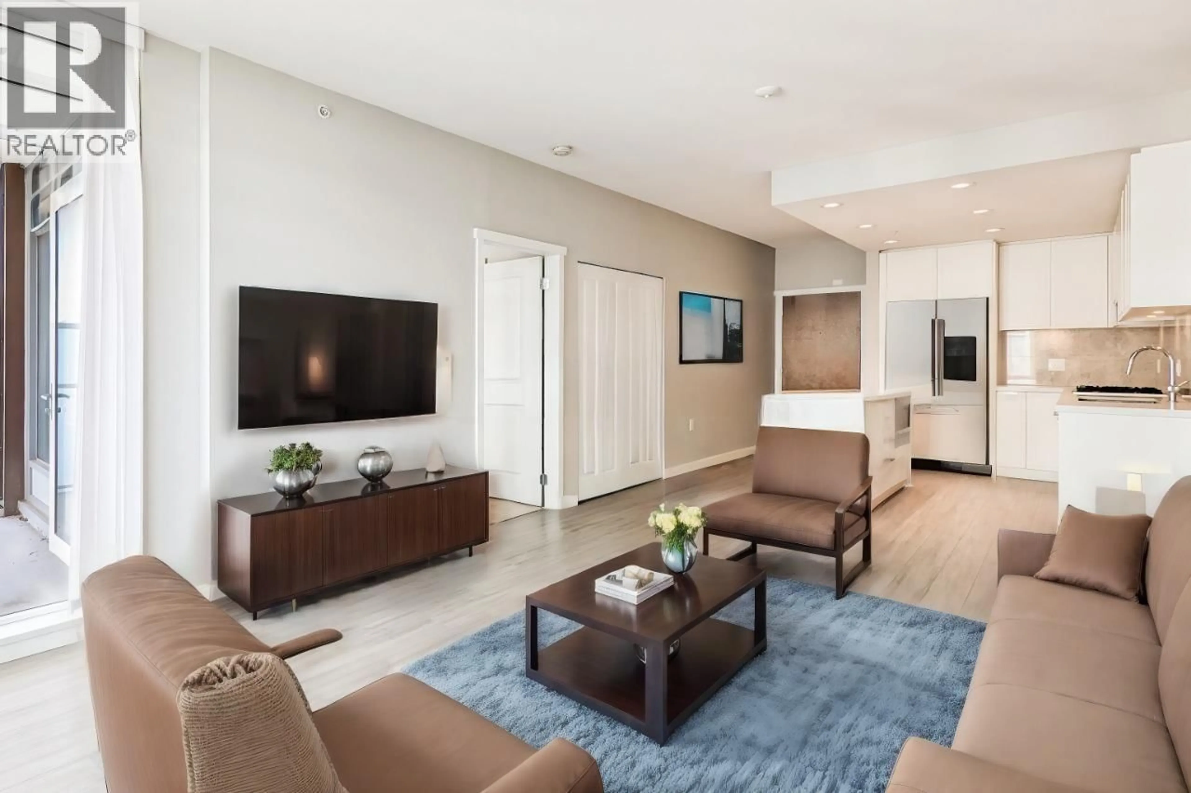 Living room with furniture, unknown for 402 - 3188 RIVERWALK AVENUE, Vancouver British Columbia V5S0E7