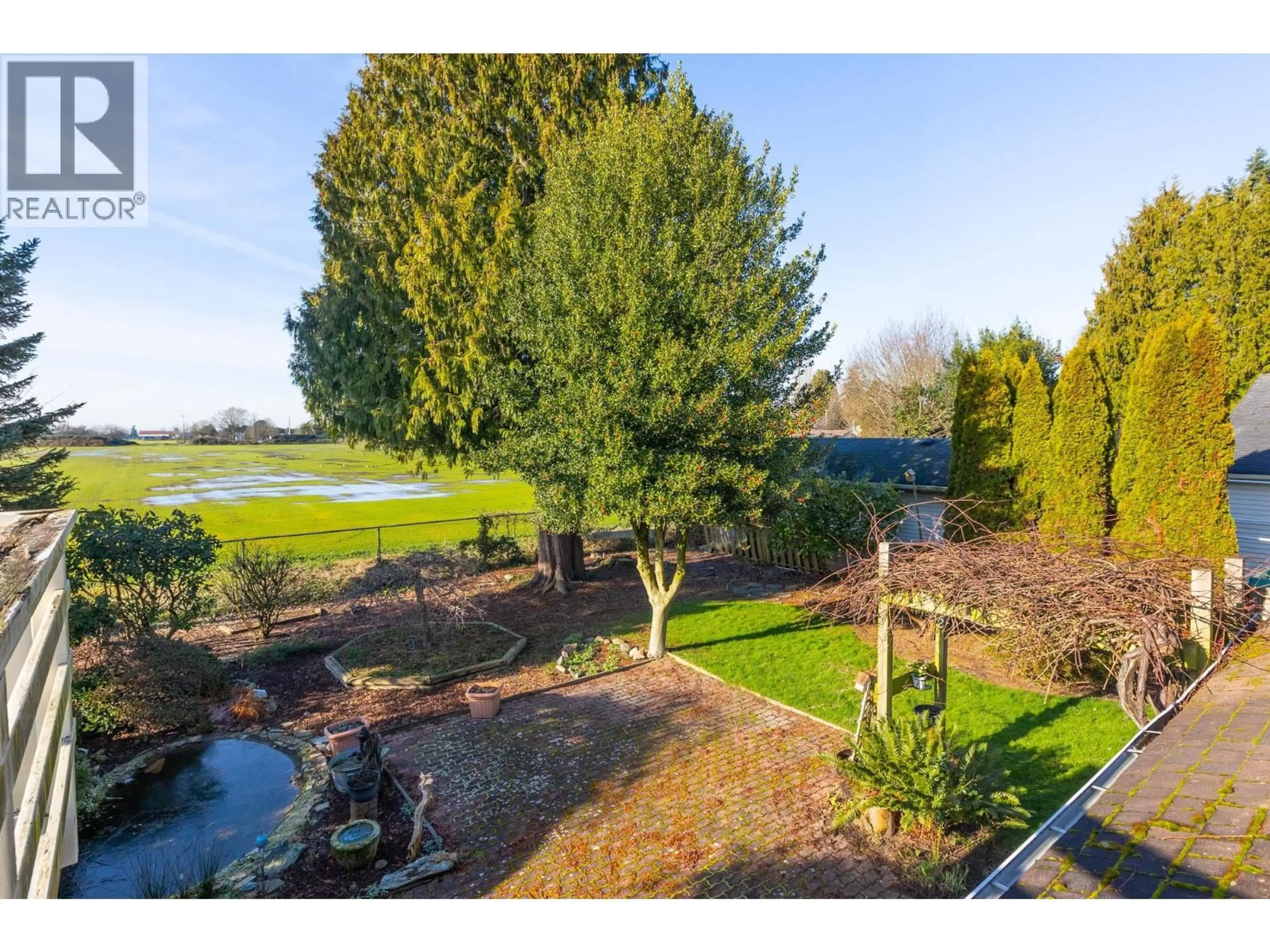 A pic from outside/outdoor area/front of a property/back of a property/a pic from drone, water/lake/river/ocean view for 4351 48A STREET, Delta British Columbia V4K2P8