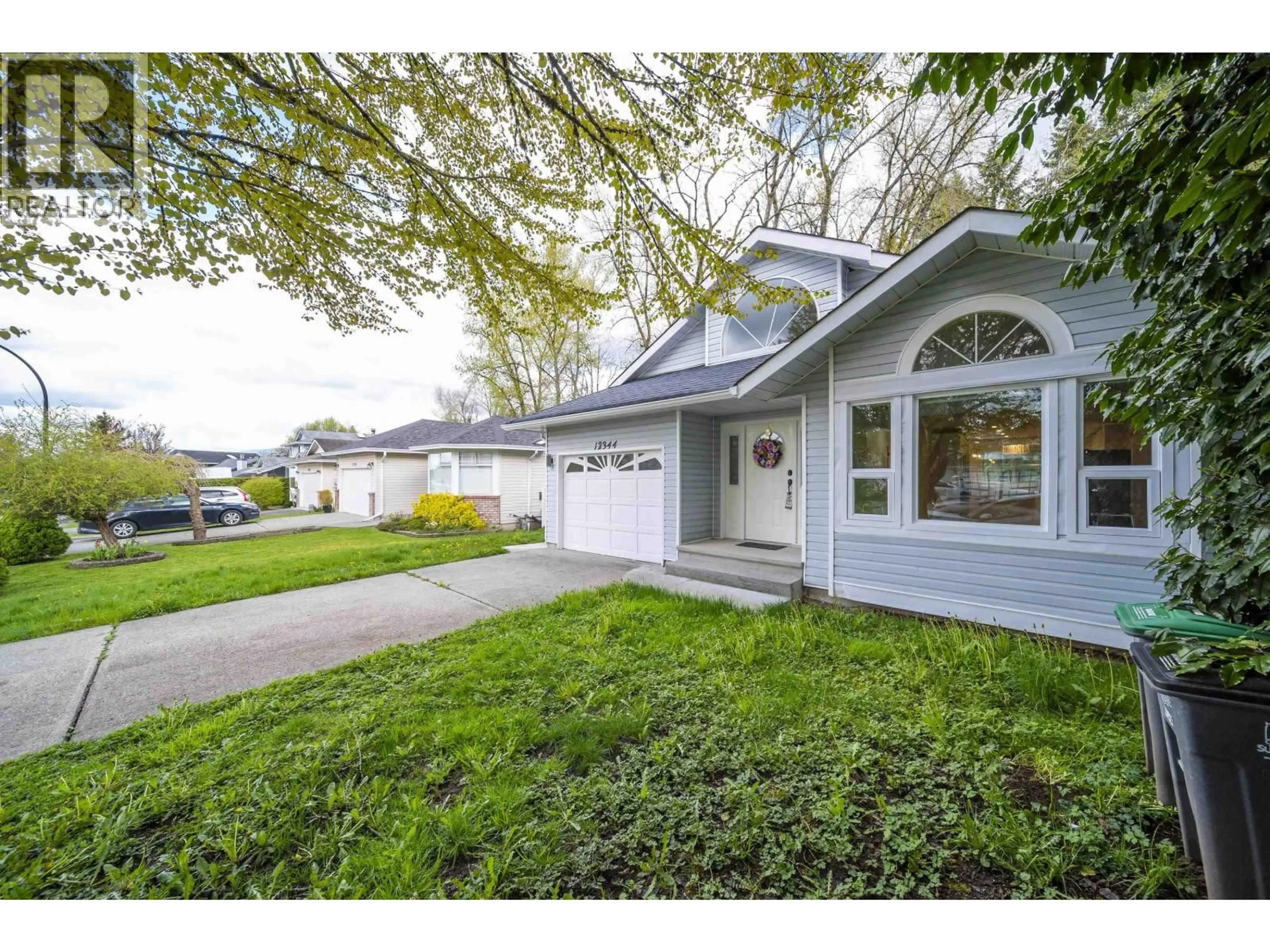 Home with vinyl exterior material, street for 12344 234 STREET, Maple Ridge British Columbia V2X0N7