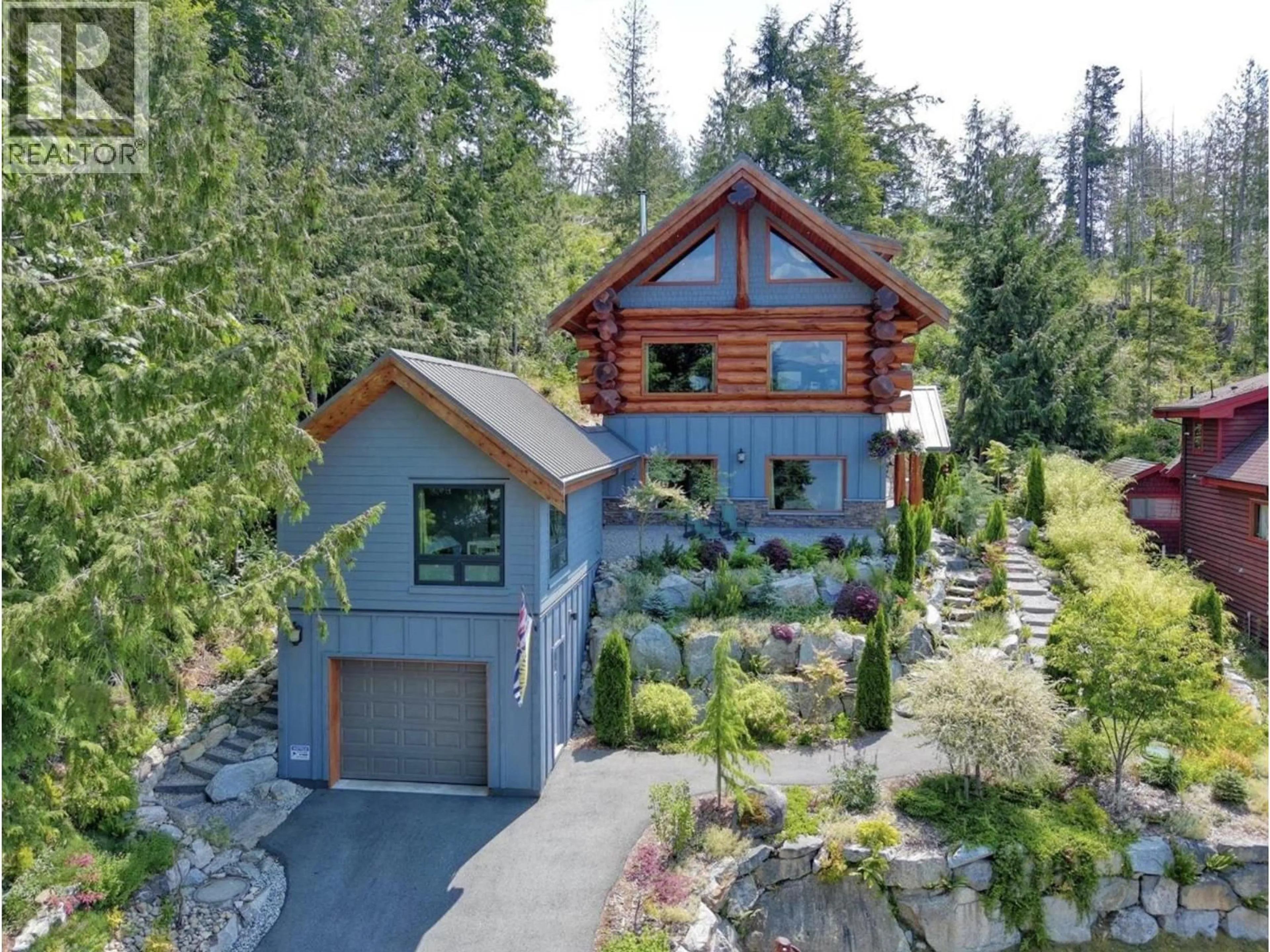 A pic from outside/outdoor area/front of a property/back of a property/a pic from drone, unknown for 5895 SKOOKUMCHUK ROAD, Sechelt British Columbia V7Z0E1