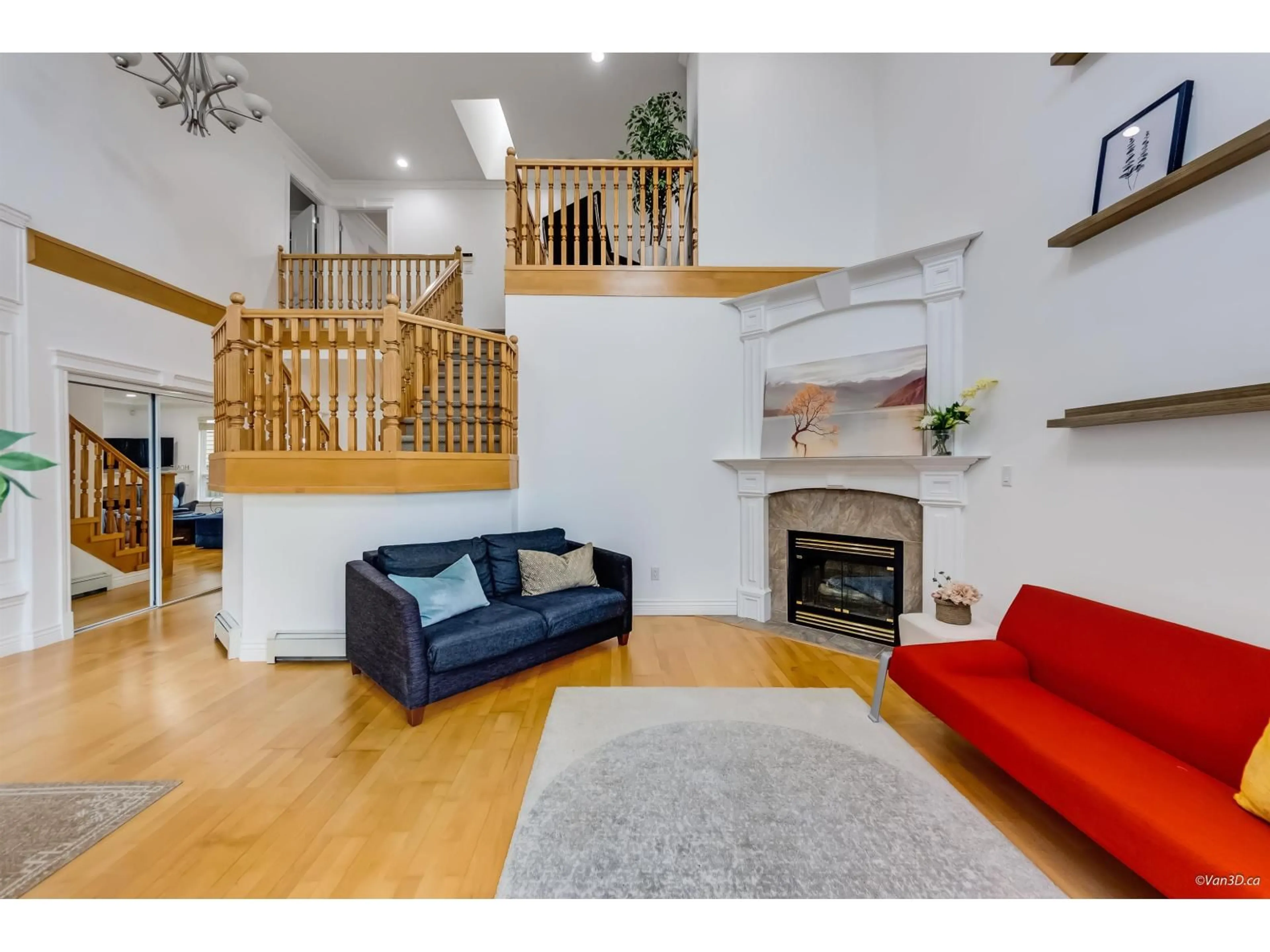 Living room with furniture, wood/laminate floor for 14906 23 AVENUE, Surrey British Columbia V4A9X2