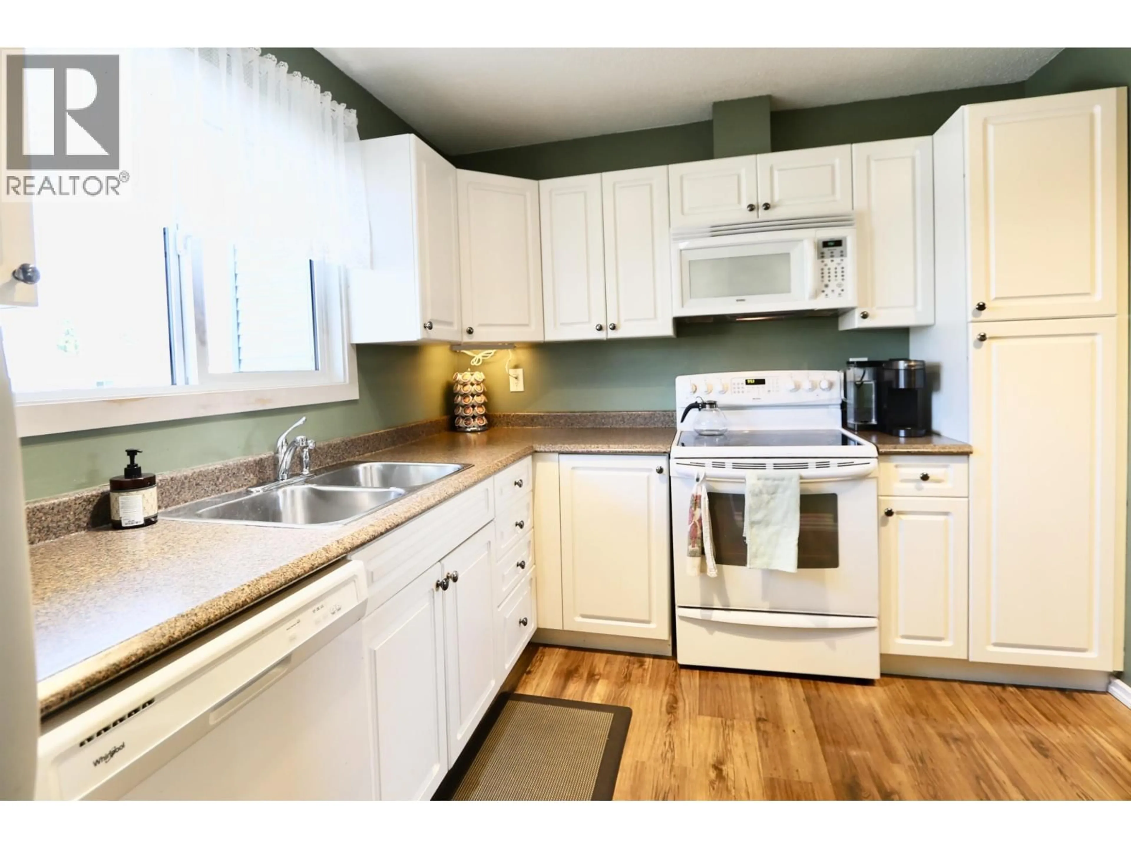 Standard kitchen, wood/laminate floor for 102 - 111 TABOR BOULEVARD, Prince George British Columbia V2M5N3