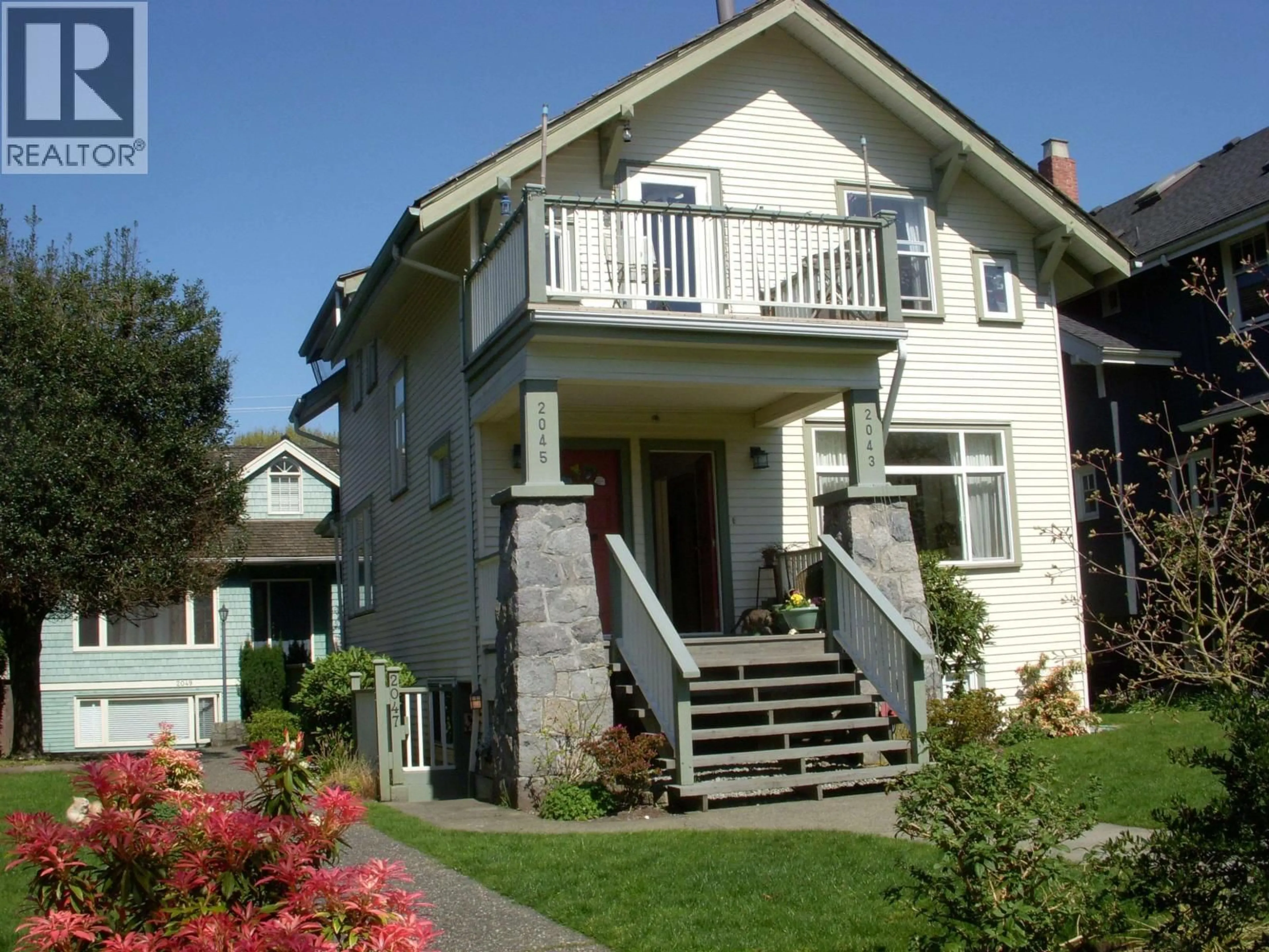 Home with vinyl exterior material, street for 2047 14TH AVENUE, Vancouver British Columbia V6J2K3