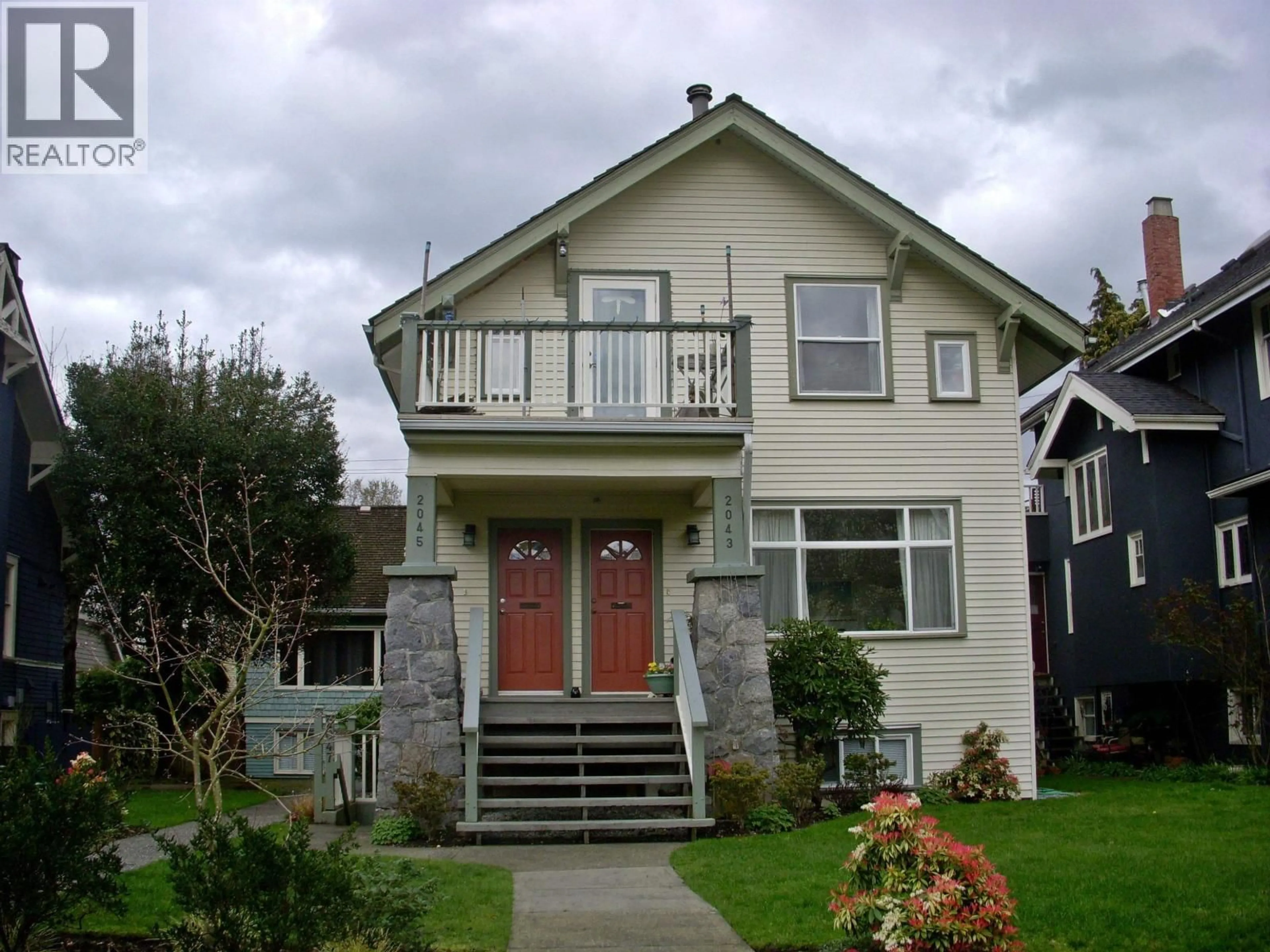 Home with vinyl exterior material, street for 2047 14TH AVENUE, Vancouver British Columbia V6J2K3