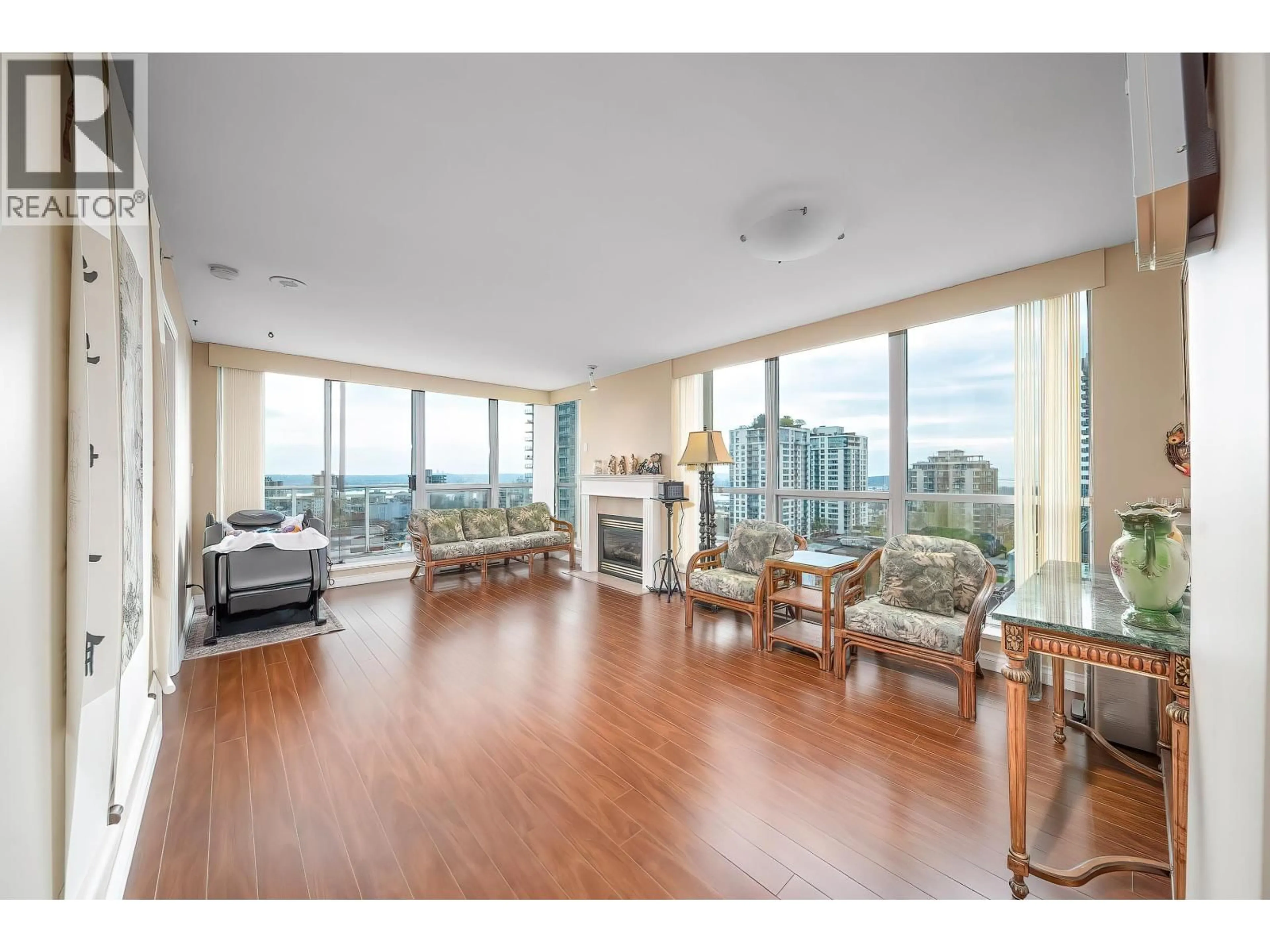 Living room with furniture, wood/laminate floor for 906 - 108 14TH STREET, Vancouver British Columbia V7L2N3