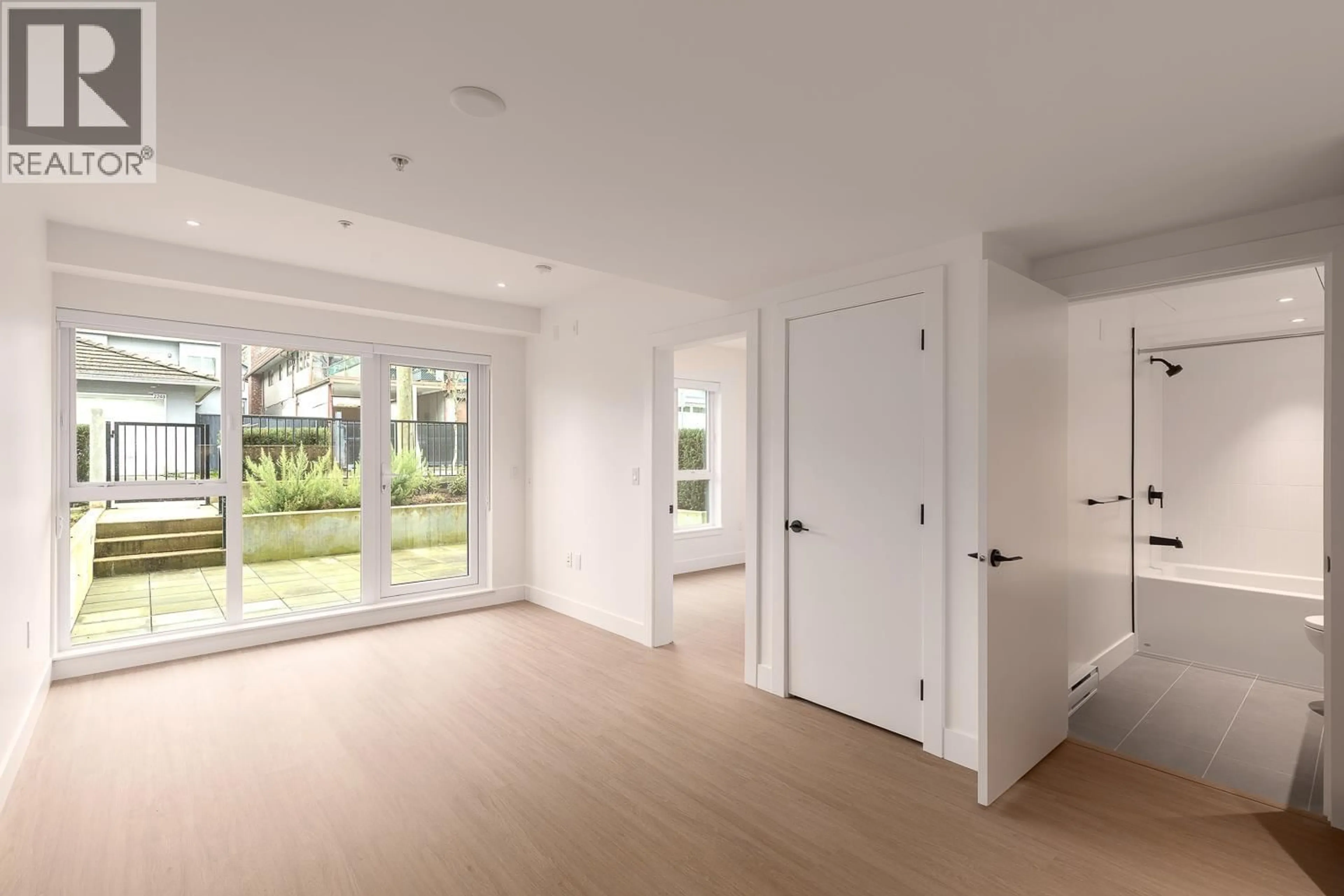 Indoor entryway for 110 - 2235 BROADWAY, Vancouver British Columbia V5N0J5