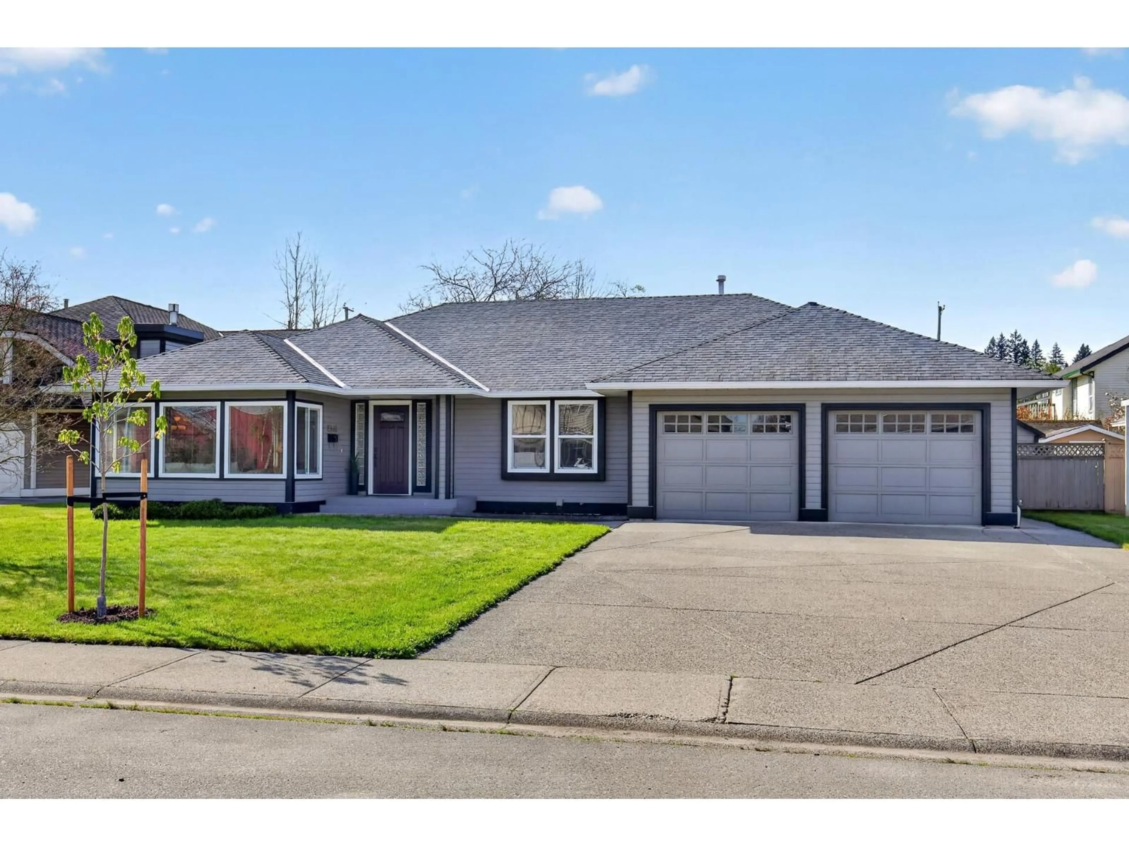 Home with vinyl exterior material, street for 21454 48A AVENUE, Langley British Columbia V3A9E5
