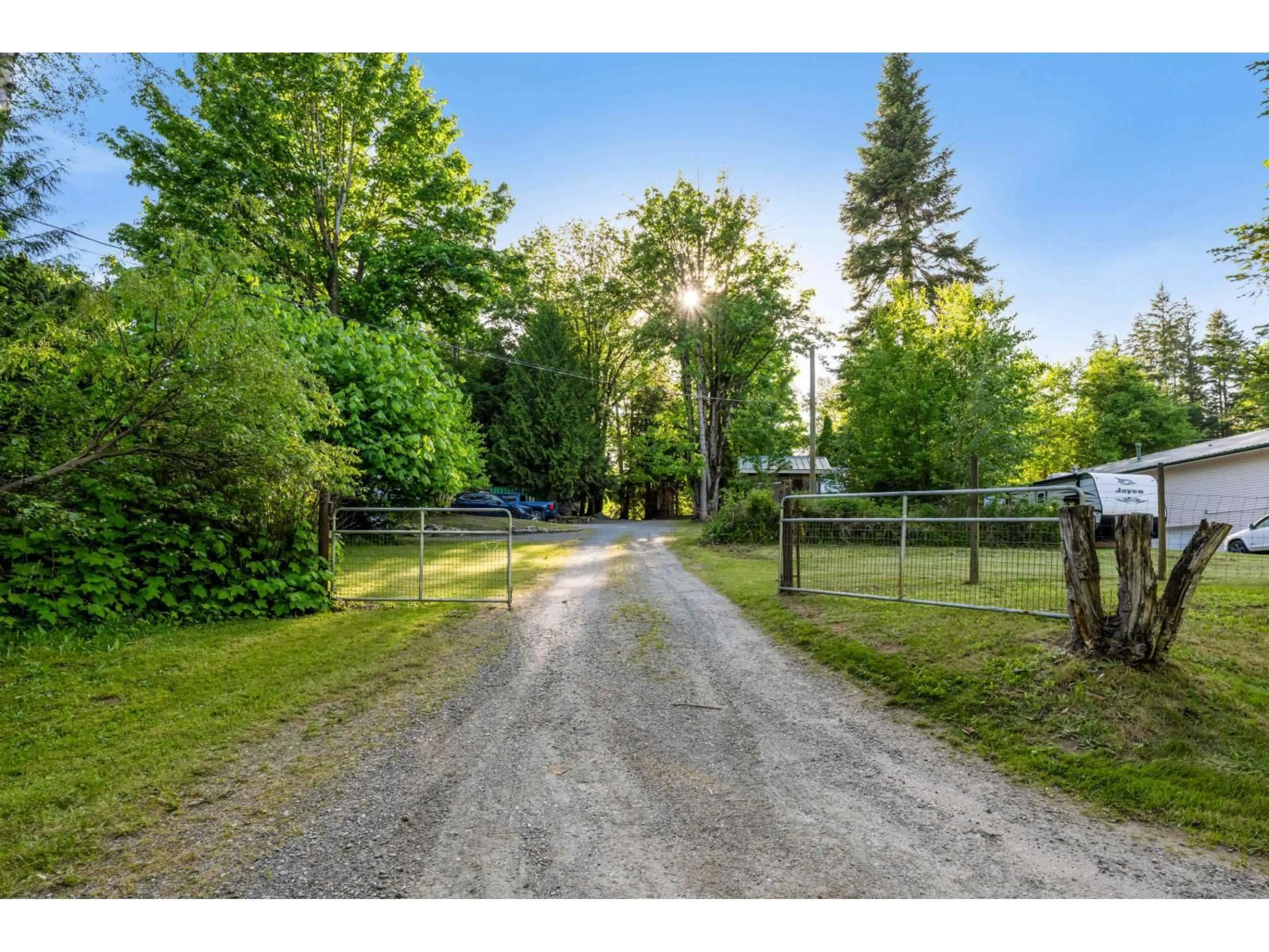 A pic from outside/outdoor area/front of a property/back of a property/a pic from drone, forest/trees view for 47400 EXTROM ROAD, Chilliwack British Columbia V2R4T1