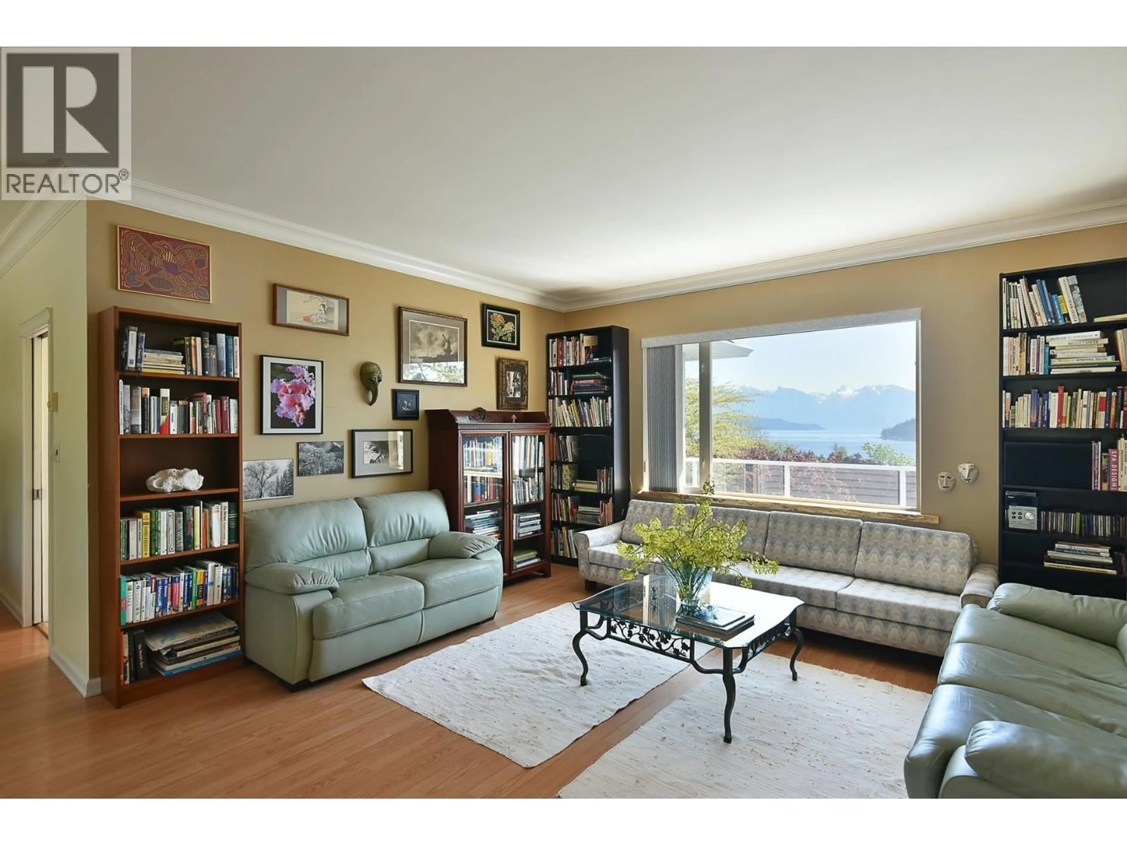 Living room with furniture, wood/laminate floor for 590-592 FLETCHER ROAD, Gibsons British Columbia V0N1V9