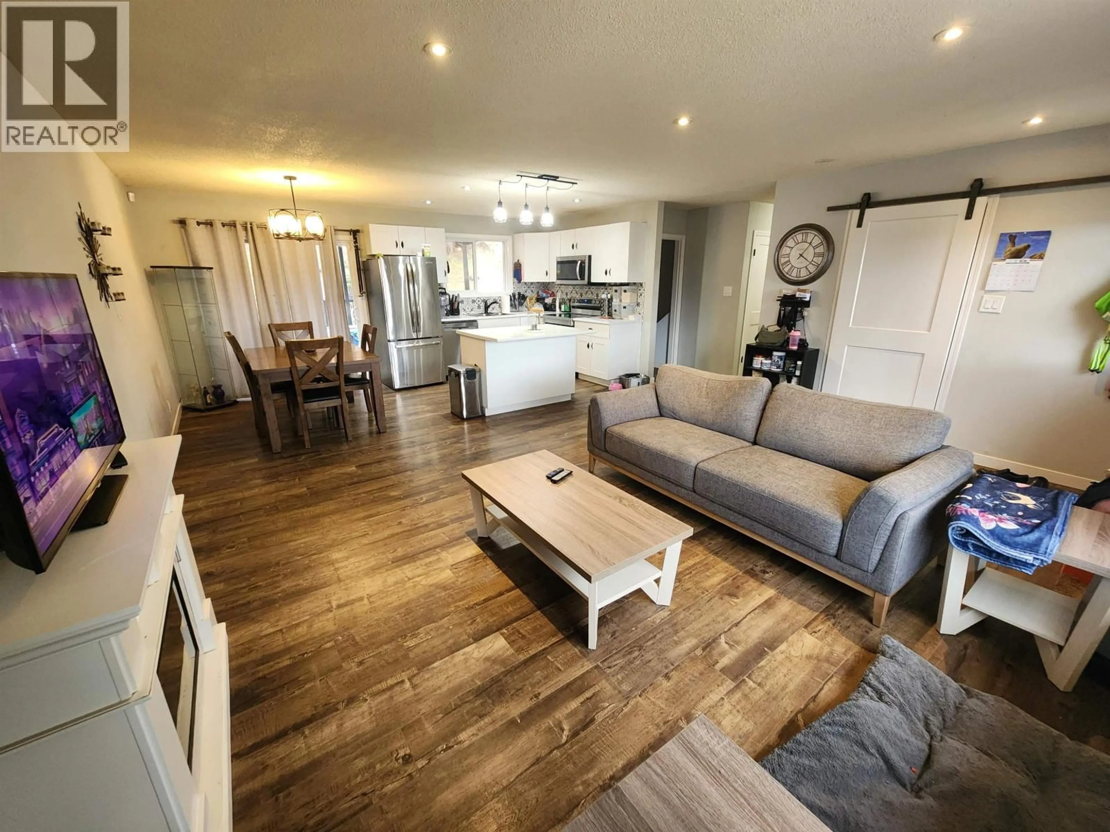 Living room with furniture, wood/laminate floor for 5801 BROCK DRIVE, Prince George British Columbia V2N2E3
