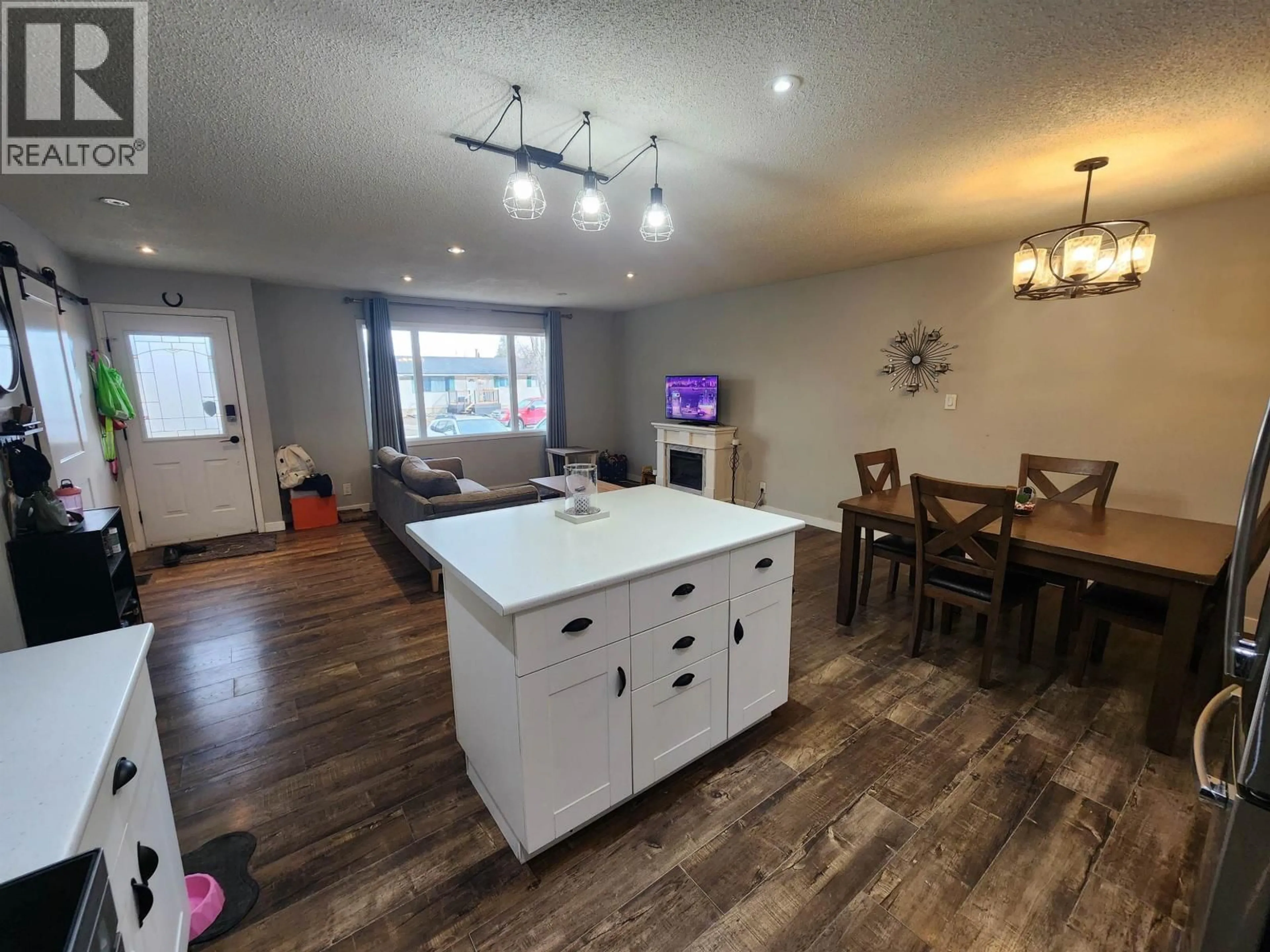 Open concept kitchen, wood/laminate floor for 5801 BROCK DRIVE, Prince George British Columbia V2N2E3
