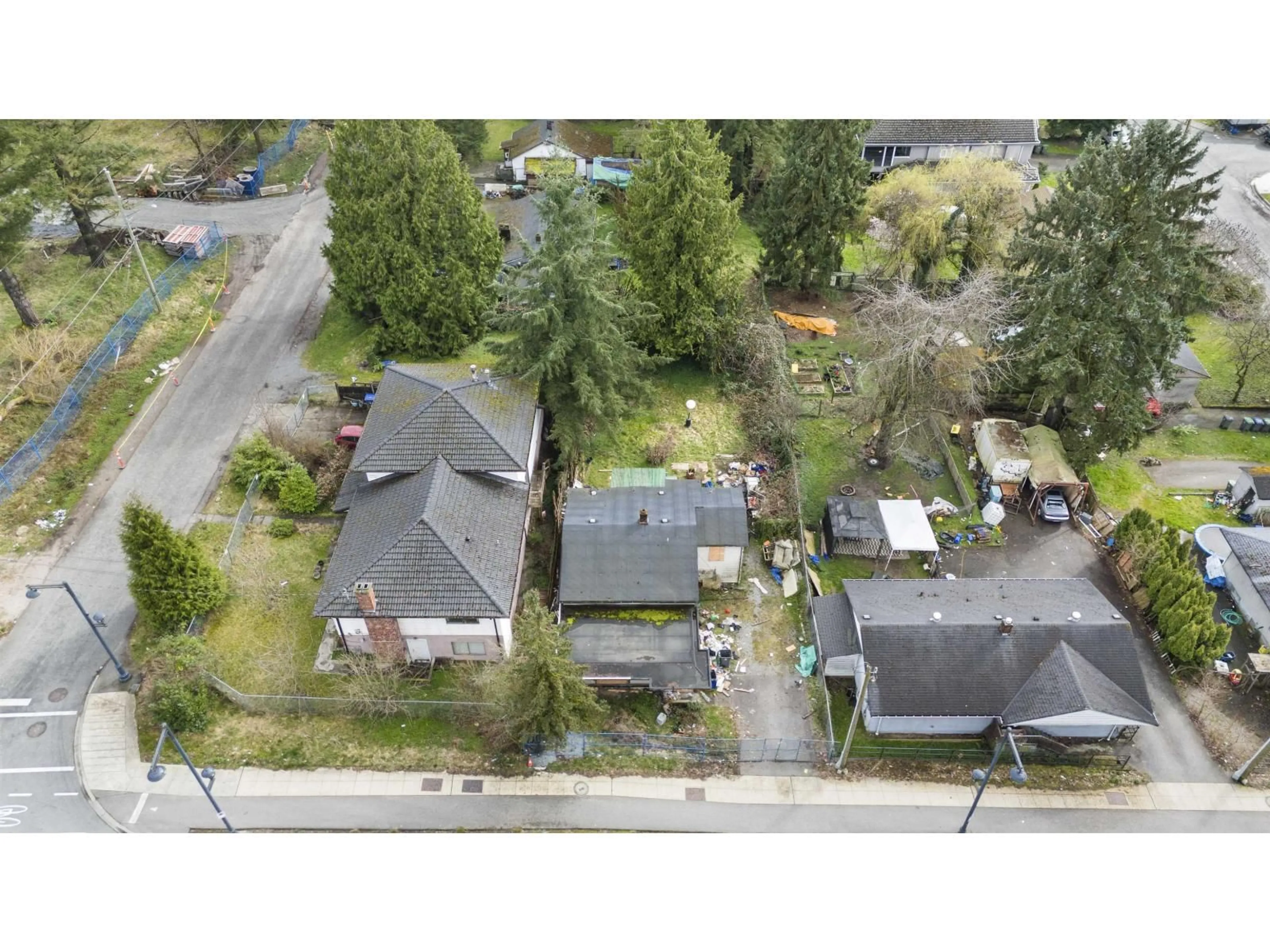 A pic from outside/outdoor area/front of a property/back of a property/a pic from drone, street for 13840 100 AVENUE, Surrey British Columbia V3T1J5