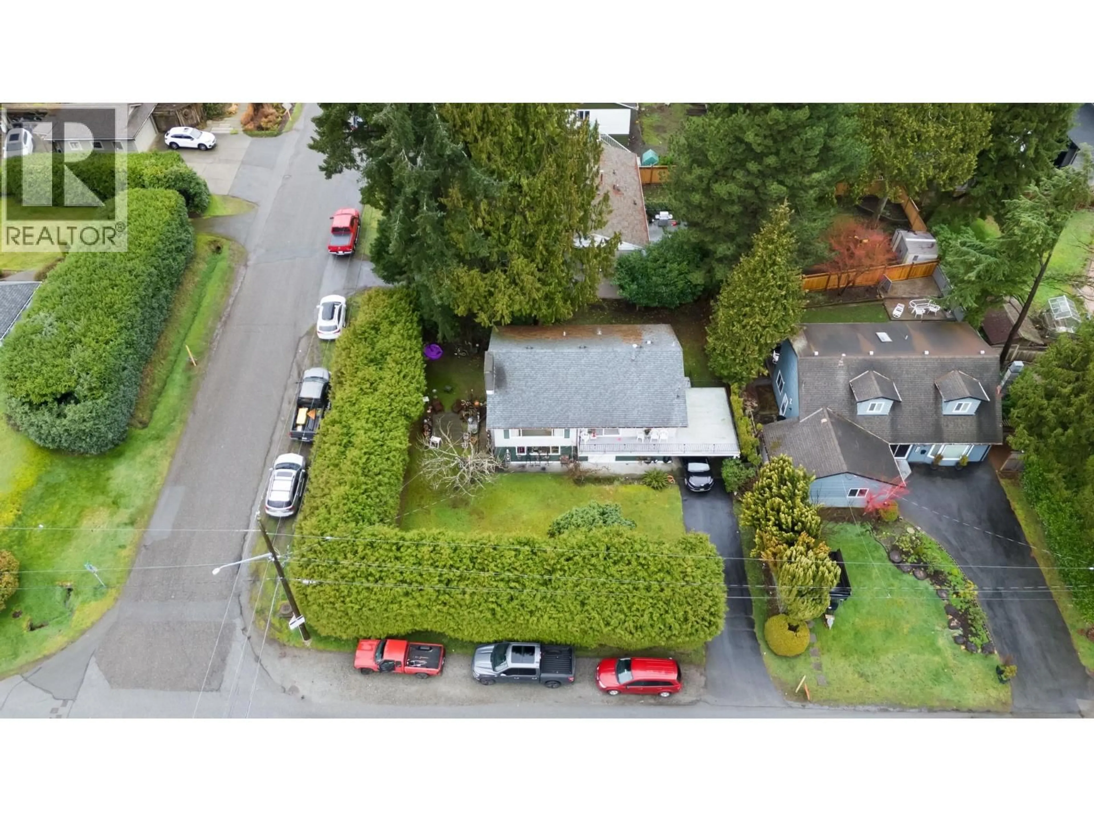 A pic from outside/outdoor area/front of a property/back of a property/a pic from drone, street for 1553 55A STREET, Delta British Columbia V4M3M8