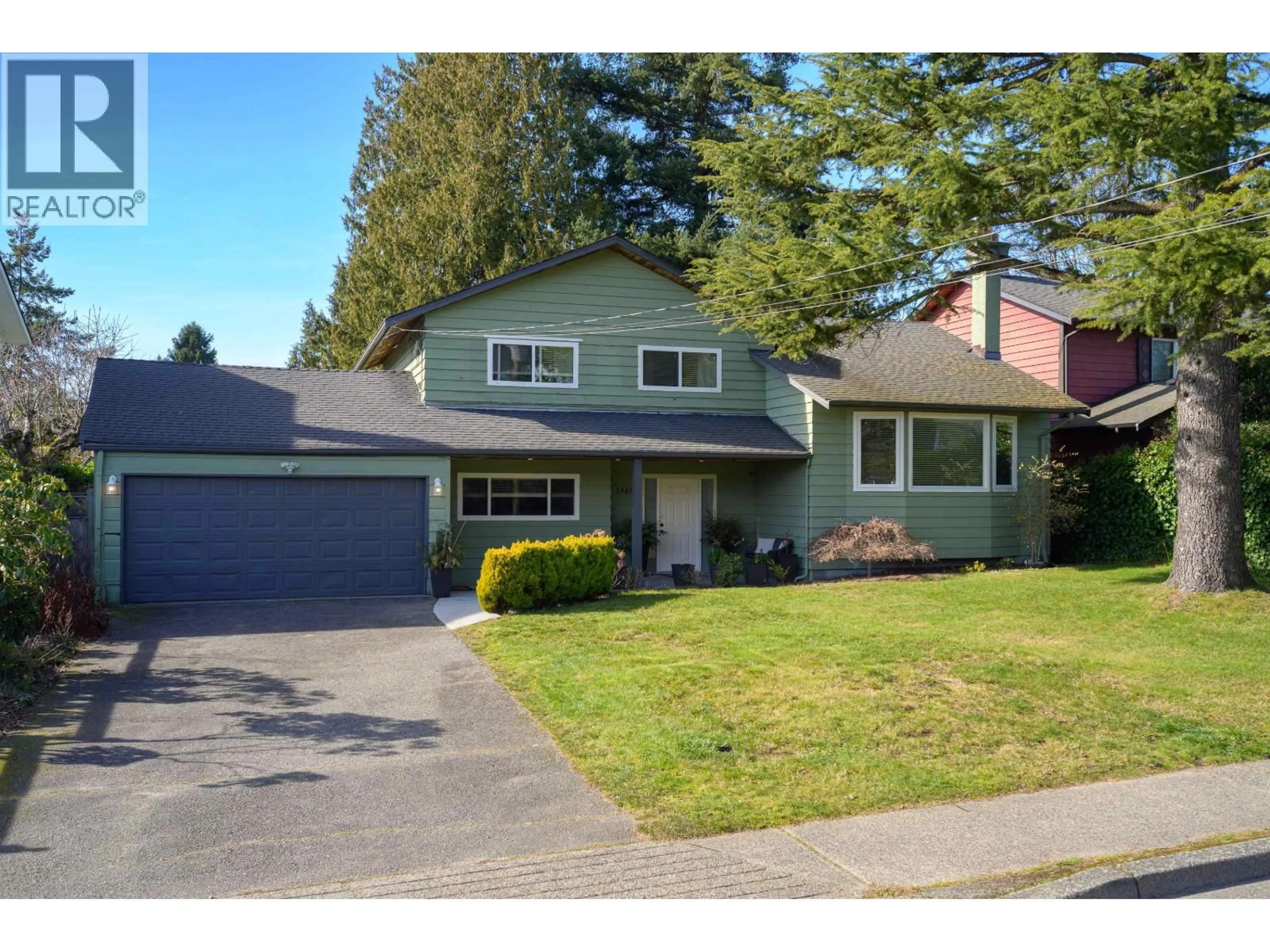 Home with vinyl exterior material, street for 1345 53A STREET, Delta British Columbia V4M3E8