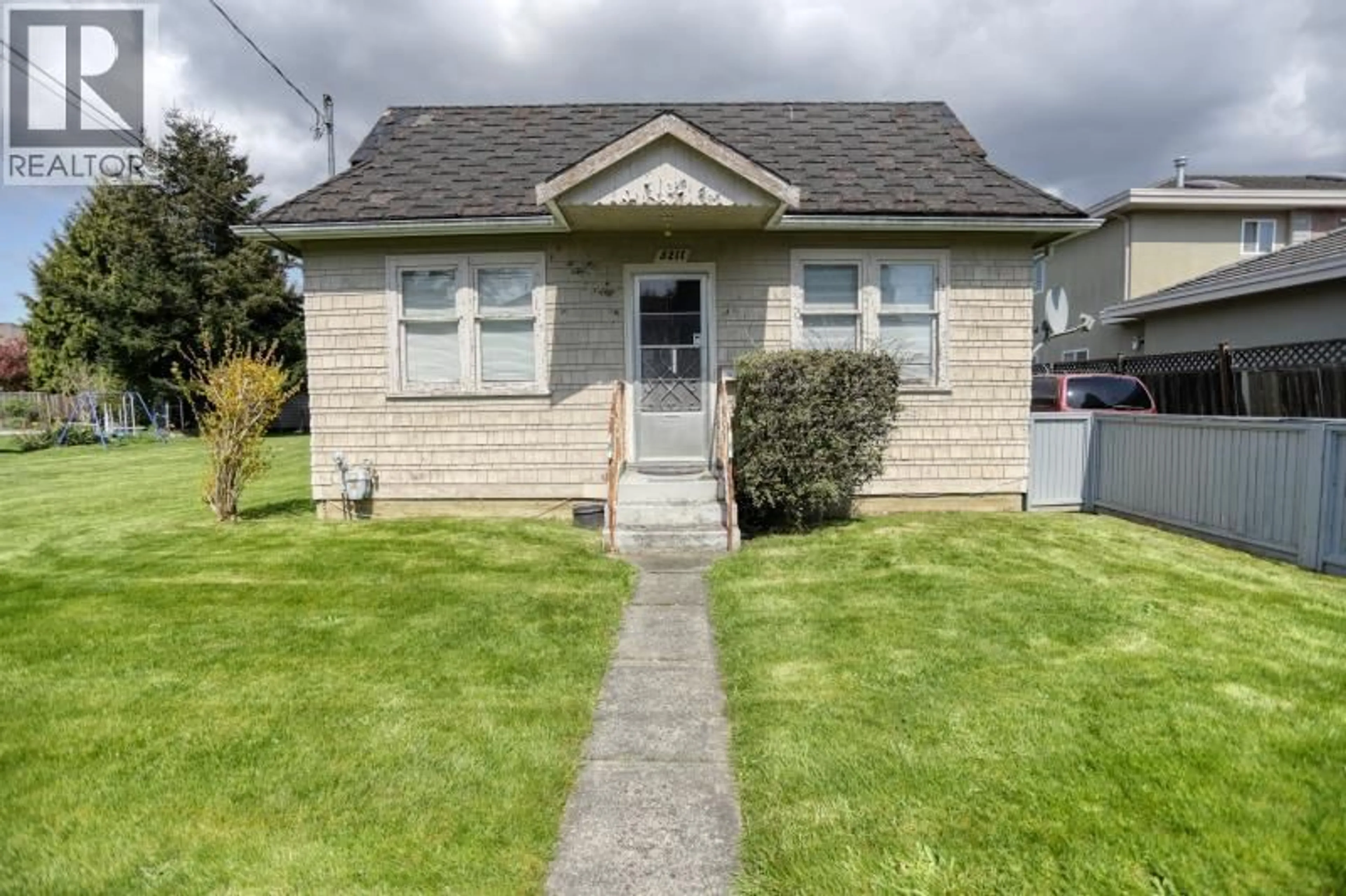 Home with vinyl exterior material, street for 5211 MAPLE ROAD, Richmond British Columbia V7E1G2