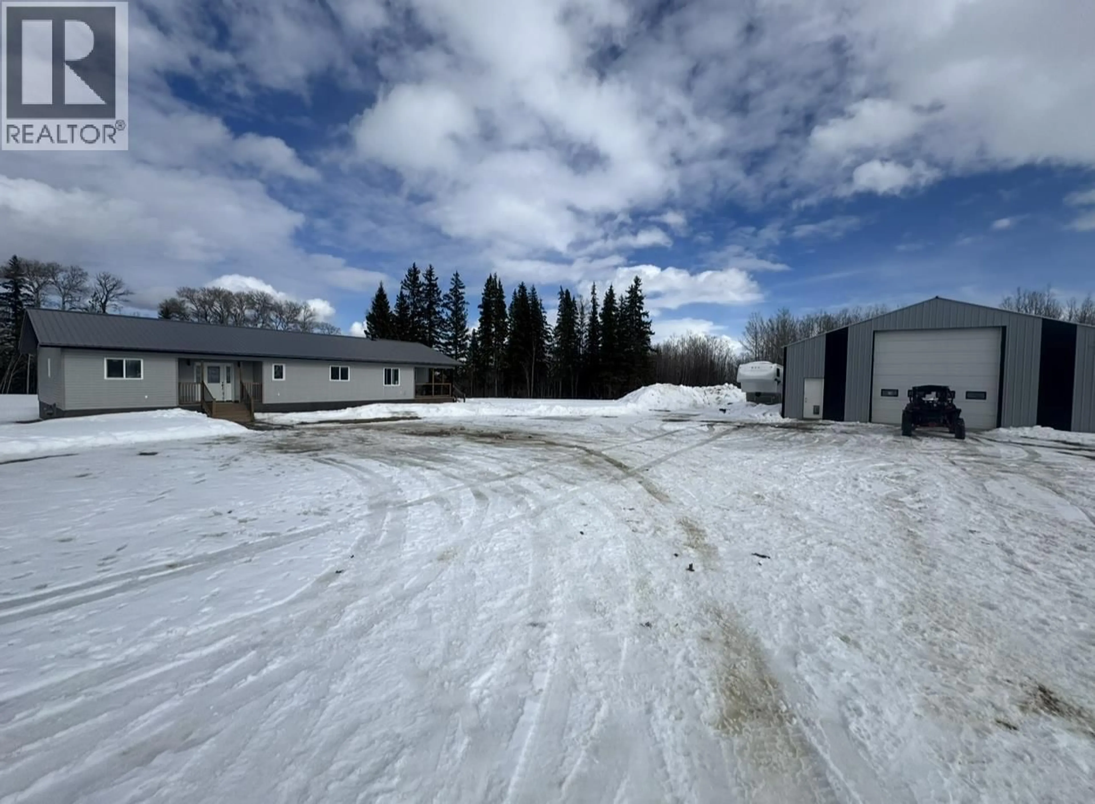 A pic from outside/outdoor area/front of a property/back of a property/a pic from drone, building for 2291 CECIL LAKE ROAD, Fort St. John British Columbia V0C1G0