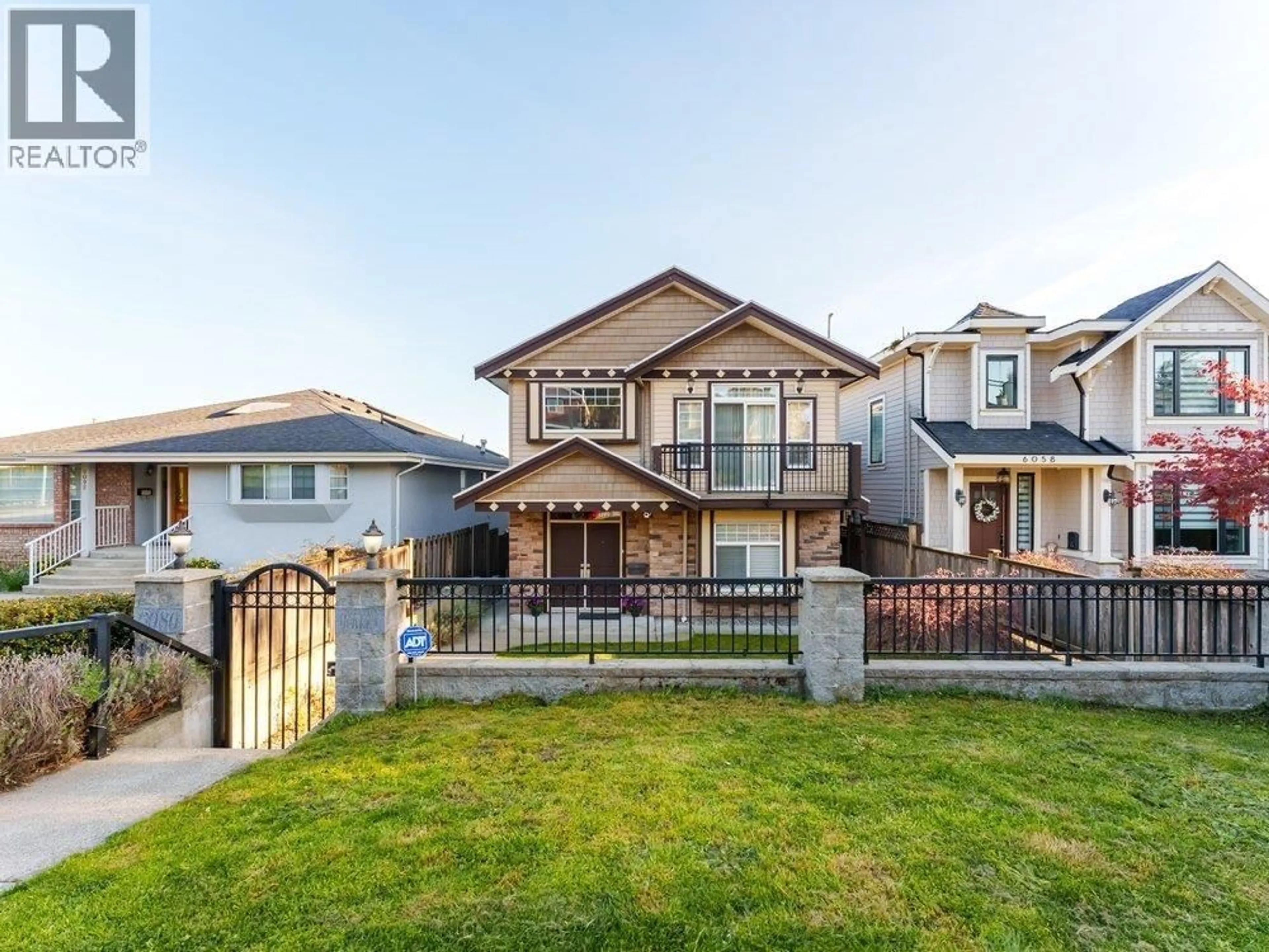 Home with vinyl exterior material, street for 6080 MCKEE STREET, Burnaby British Columbia V5J2V5