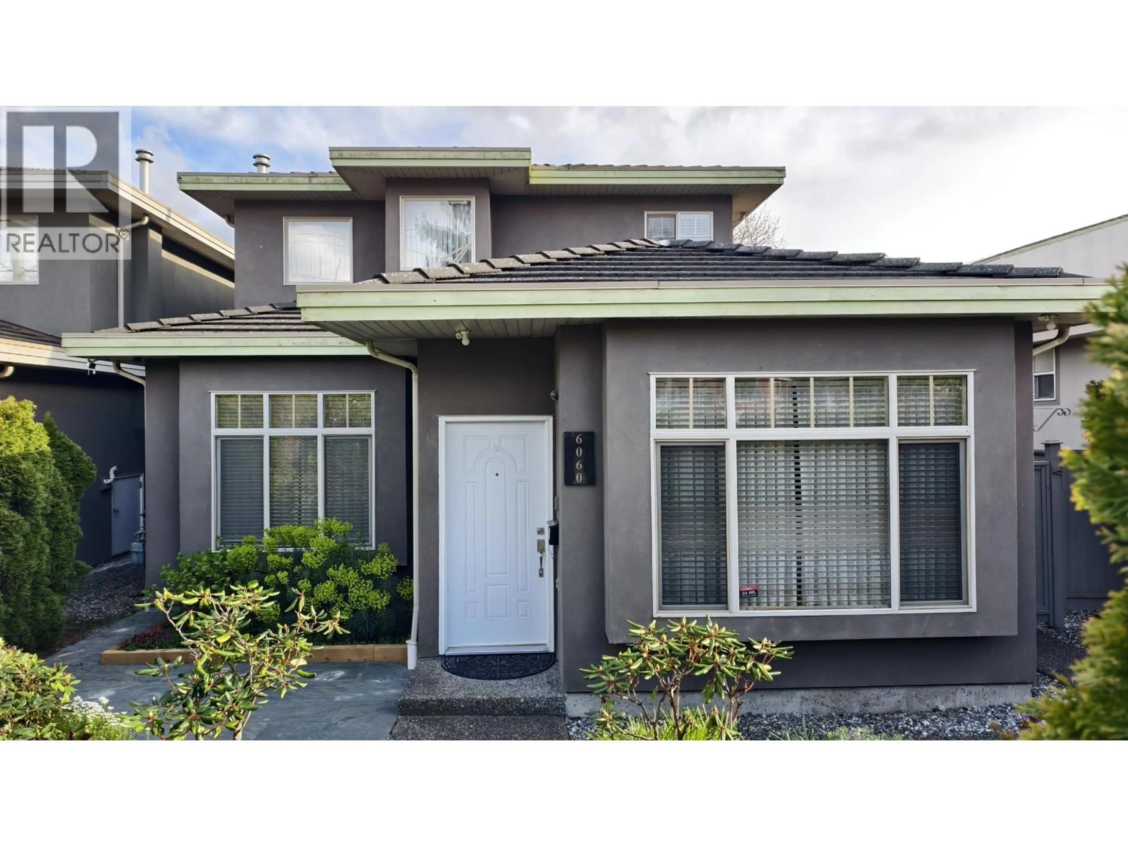 Home with vinyl exterior material, street for 6060 CLINTON STREET, Burnaby British Columbia V5J2M5