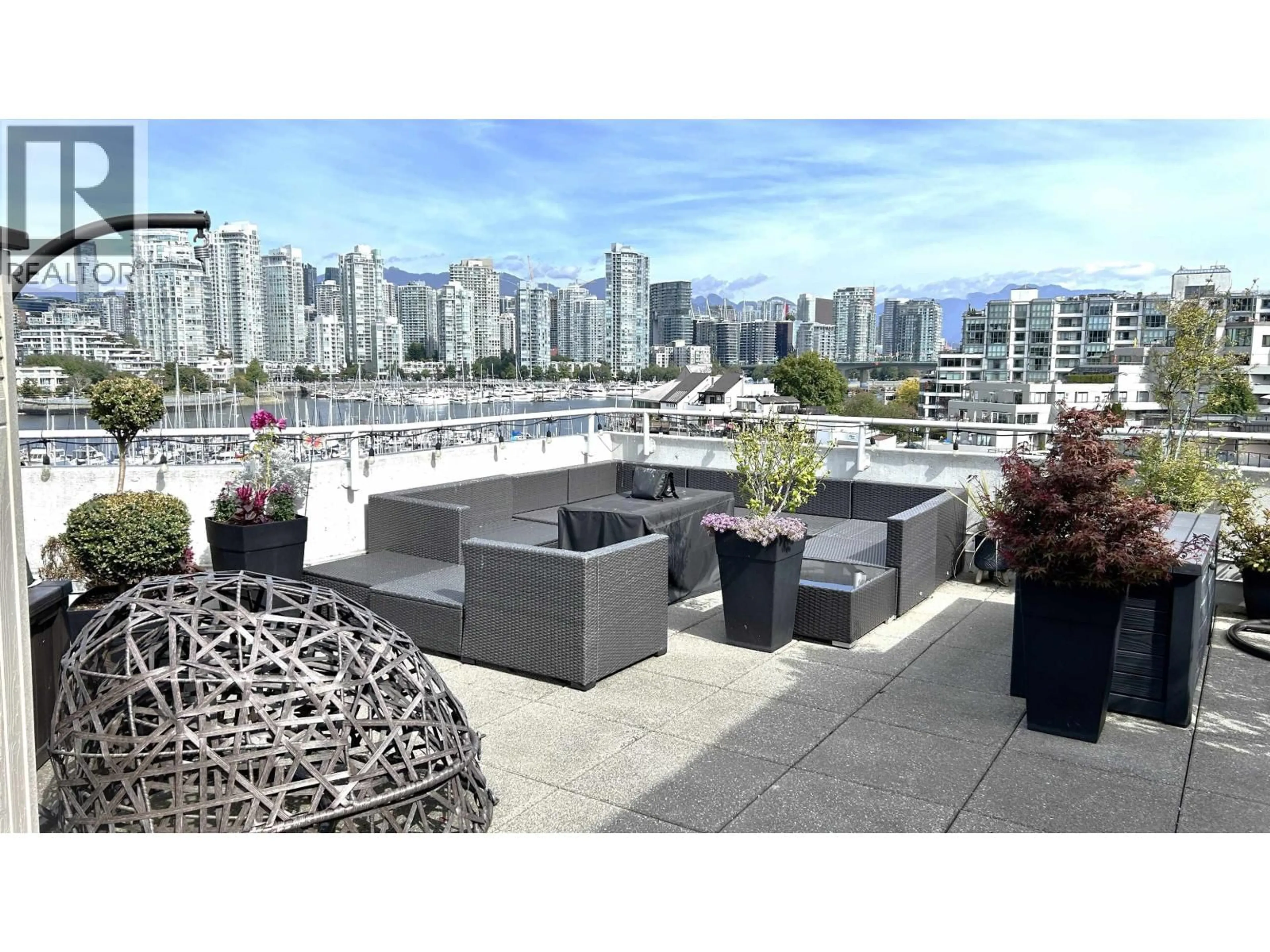 Patio, city buildings view from balcony for 315 - 674 LEG IN BOOT SQUARE, Vancouver British Columbia V5Z4B4
