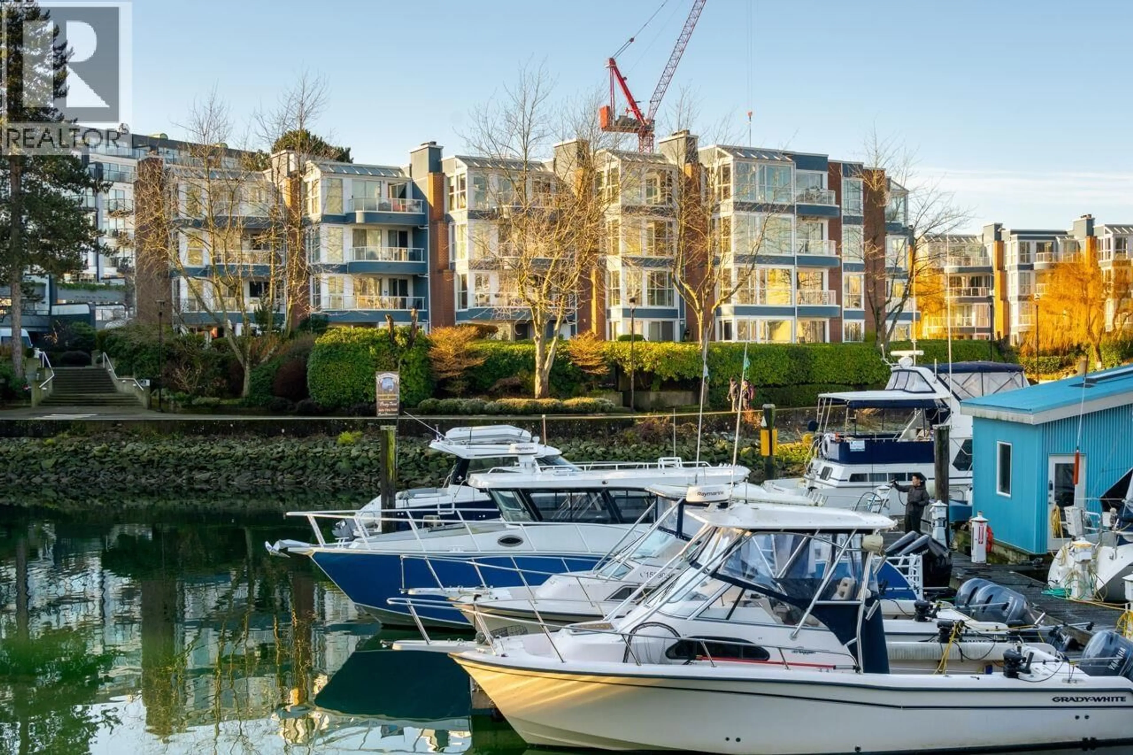 A pic from outside/outdoor area/front of a property/back of a property/a pic from drone, water/lake/river/ocean view for 302 - 1502 ISLAND PARK WALK, Vancouver British Columbia V6H3Z8