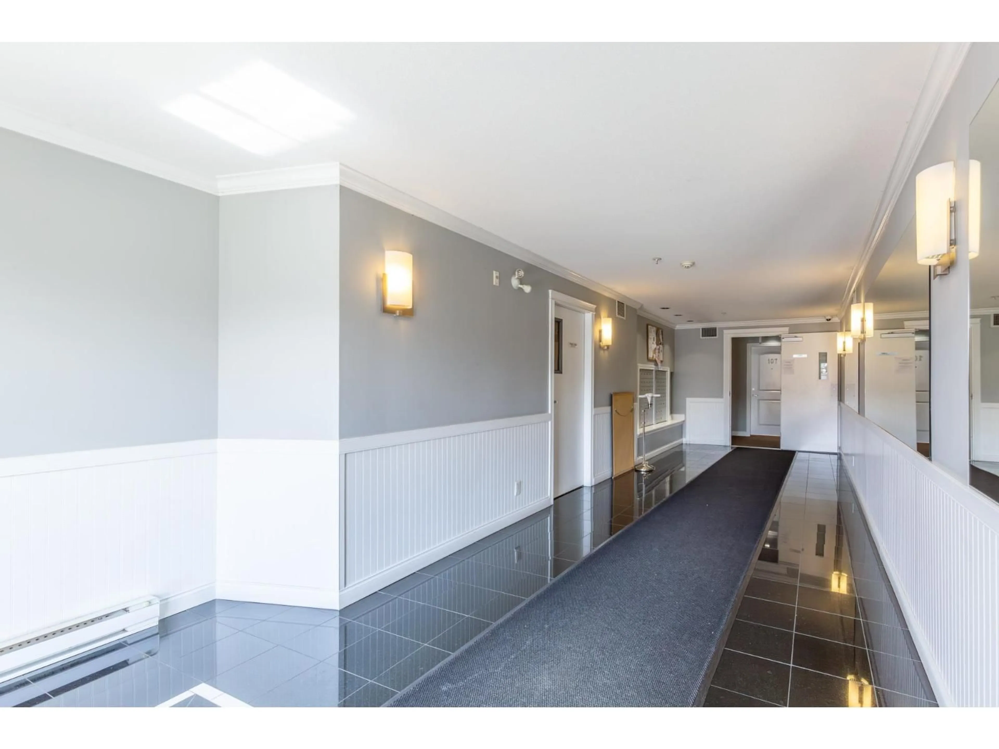 Indoor foyer for 317 - 19939 55A AVENUE, Langley British Columbia V4P1R9