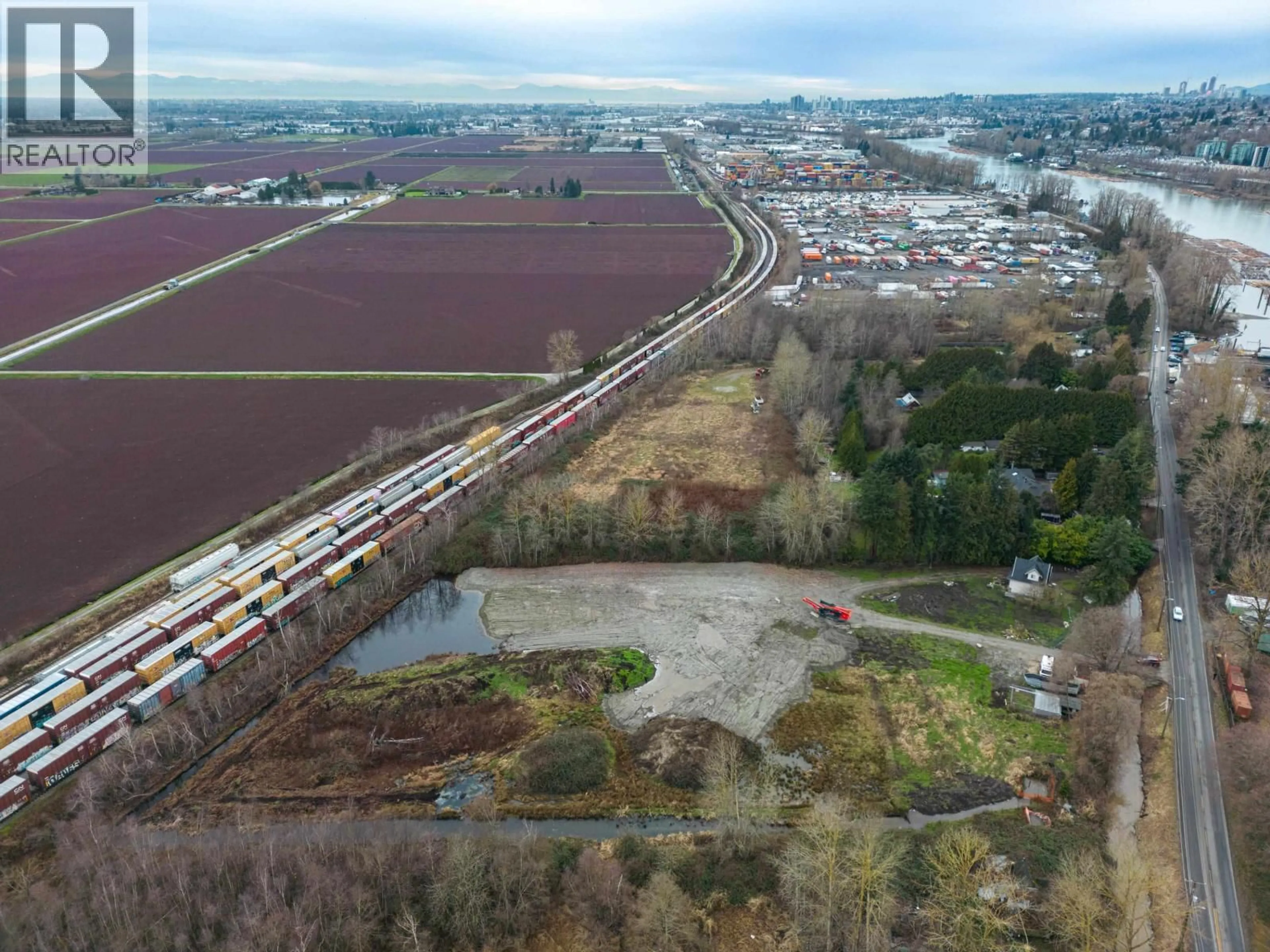 A pic from outside/outdoor area/front of a property/back of a property/a pic from drone, street for 17260 RIVER ROAD, Richmond British Columbia V6V1L9