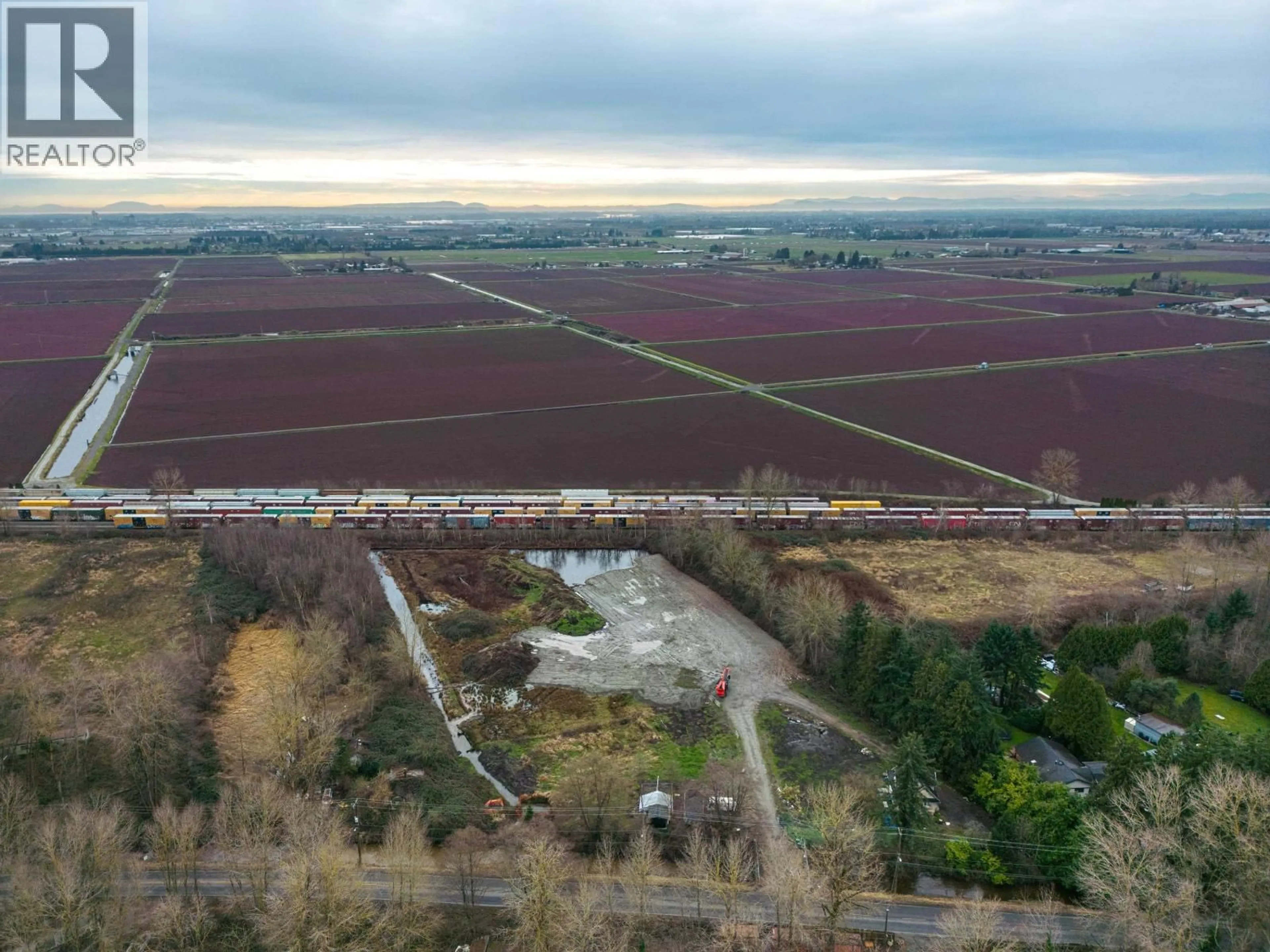 A pic from outside/outdoor area/front of a property/back of a property/a pic from drone, forest/trees view for 17260 RIVER ROAD, Richmond British Columbia V6V1L9