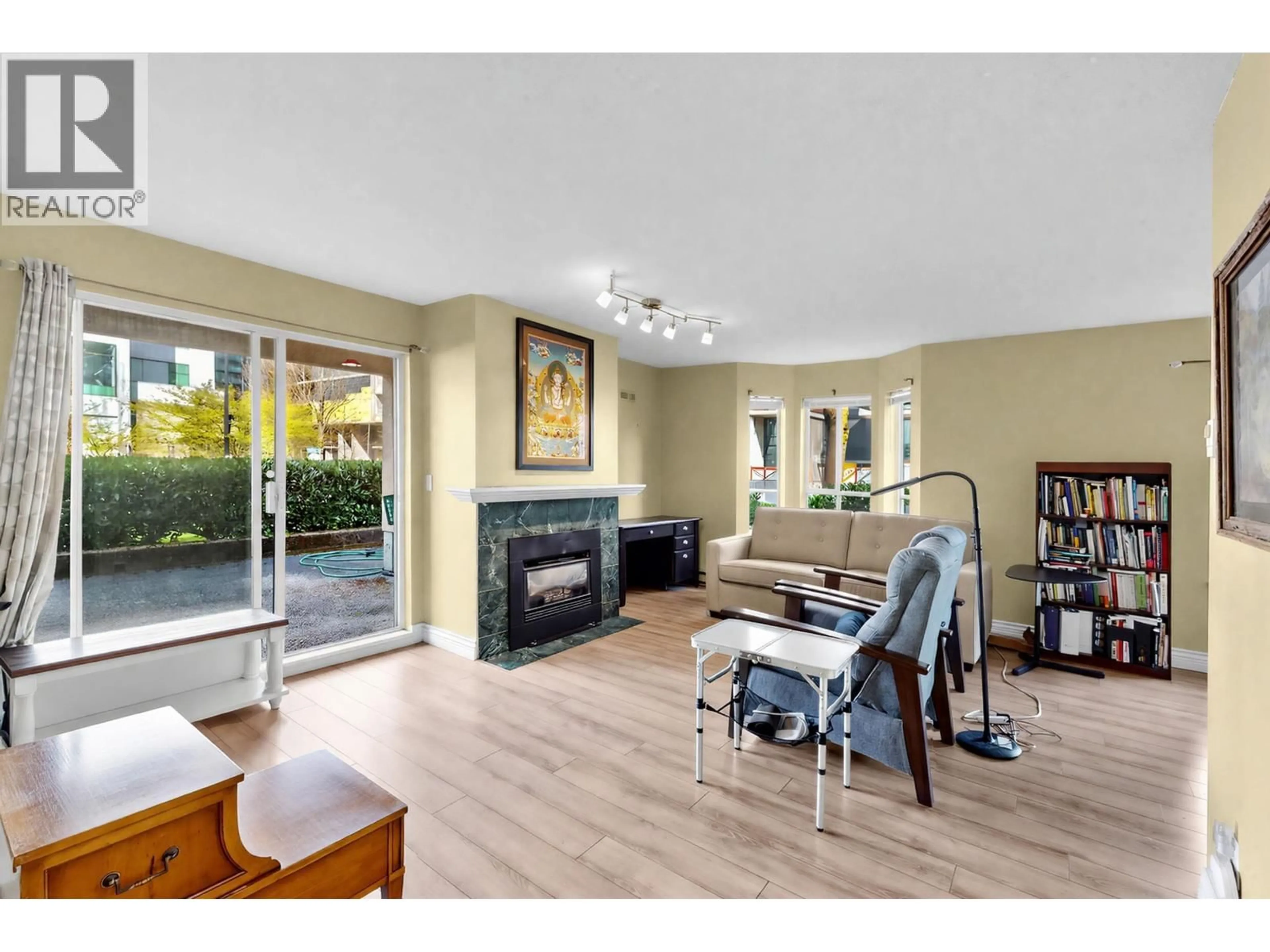 Living room with furniture, wood/laminate floor for 104 - 1175 HEFFLEY CRESCENT, Coquitlam British Columbia V3B7J2