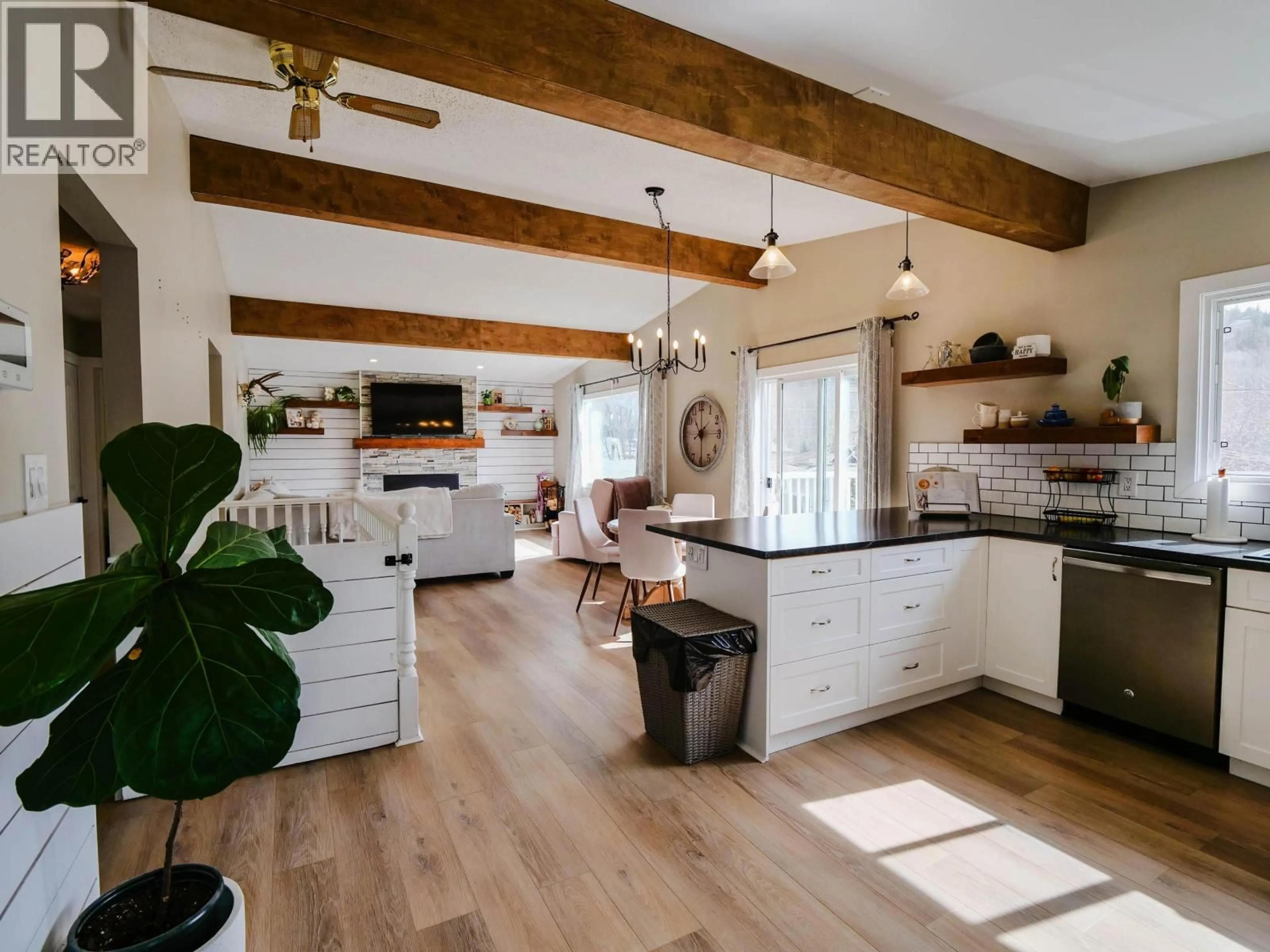 Open concept kitchen, wood/laminate floor for 120 LINDSAY STREET, Quesnel British Columbia V2J3E3