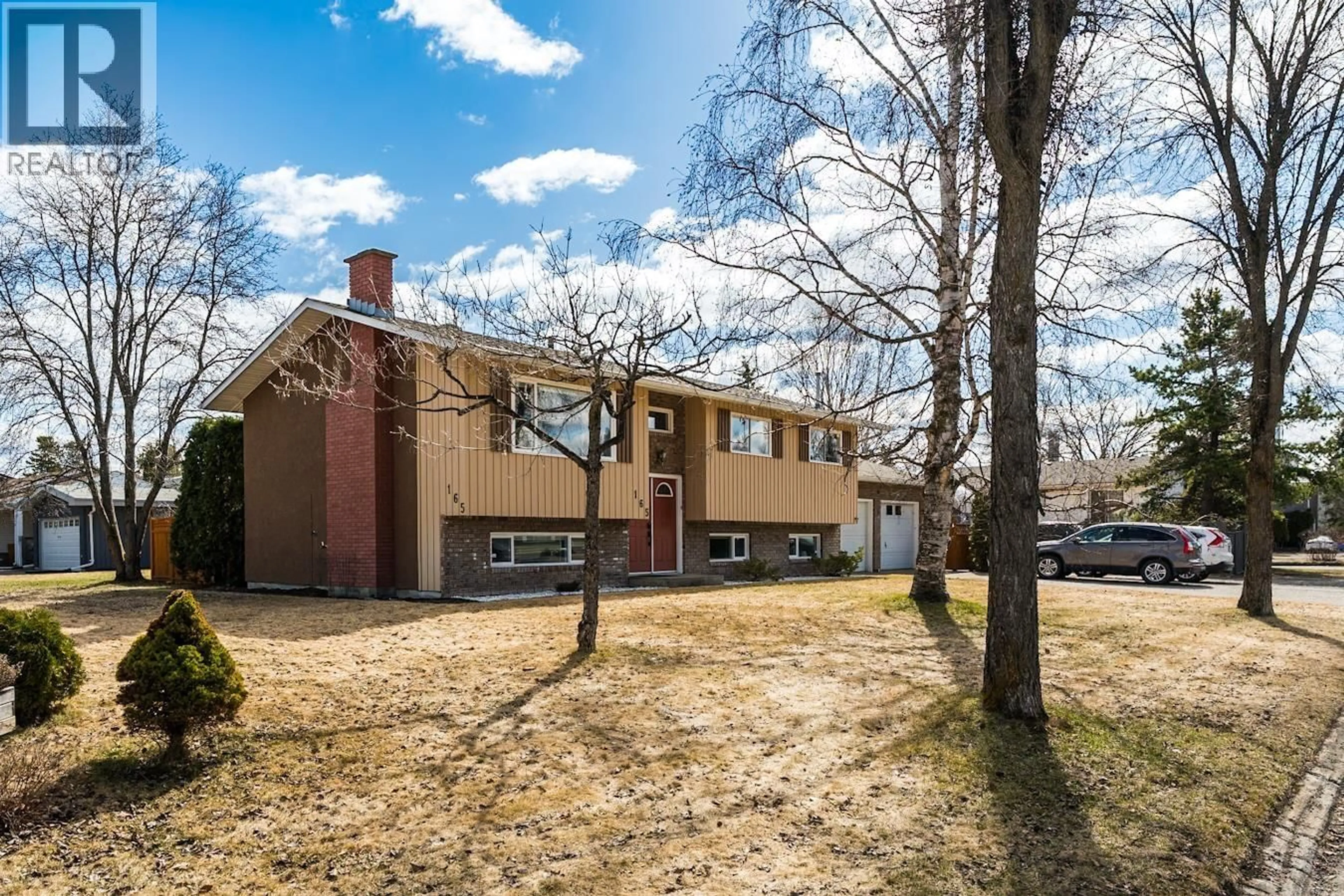 Home with brick exterior material, unknown for 165 NUGGET AVENUE, Prince George British Columbia V2M2M5