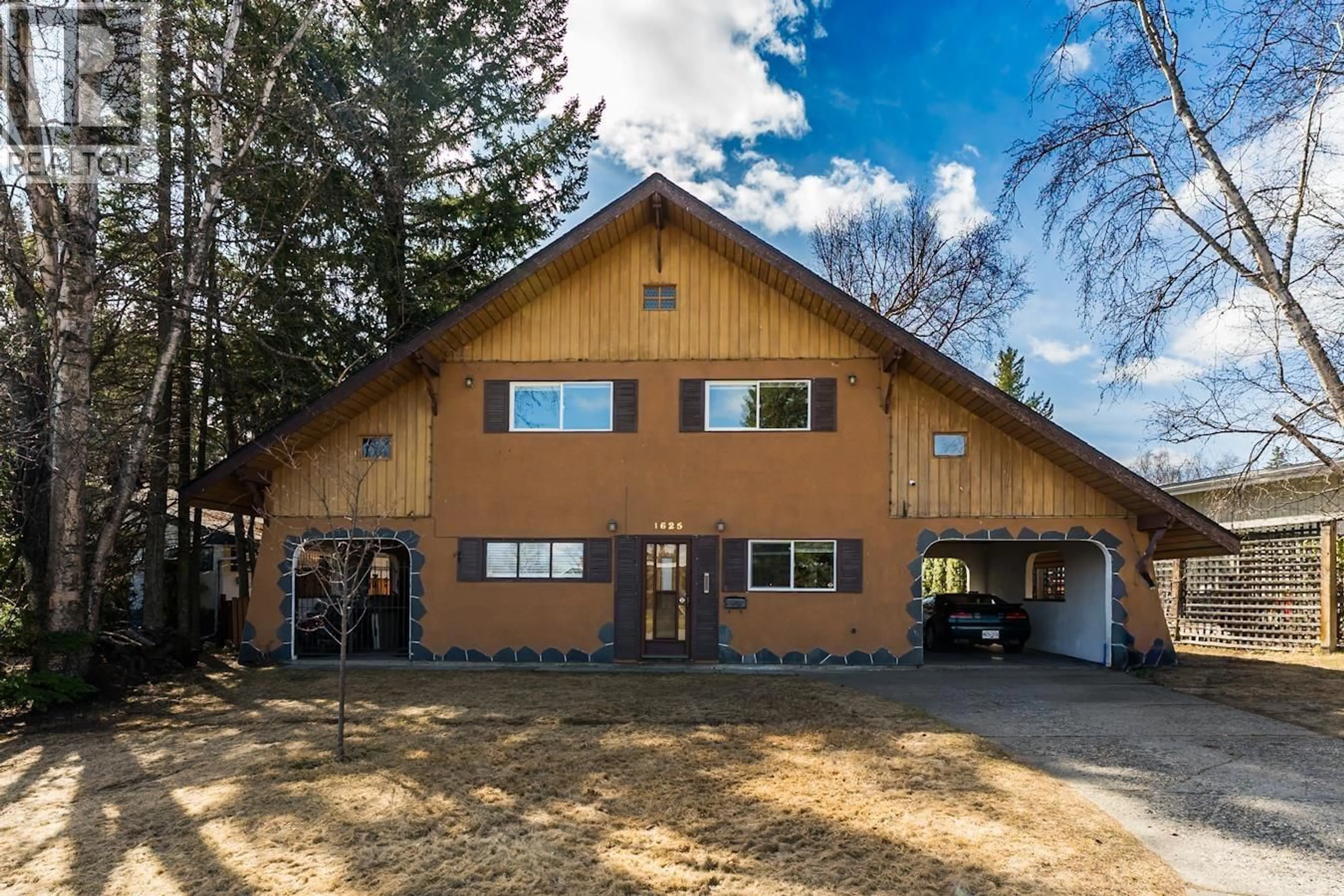 Home with vinyl exterior material, street for 1625 GILLETT STREET, Prince George British Columbia V2M2V5