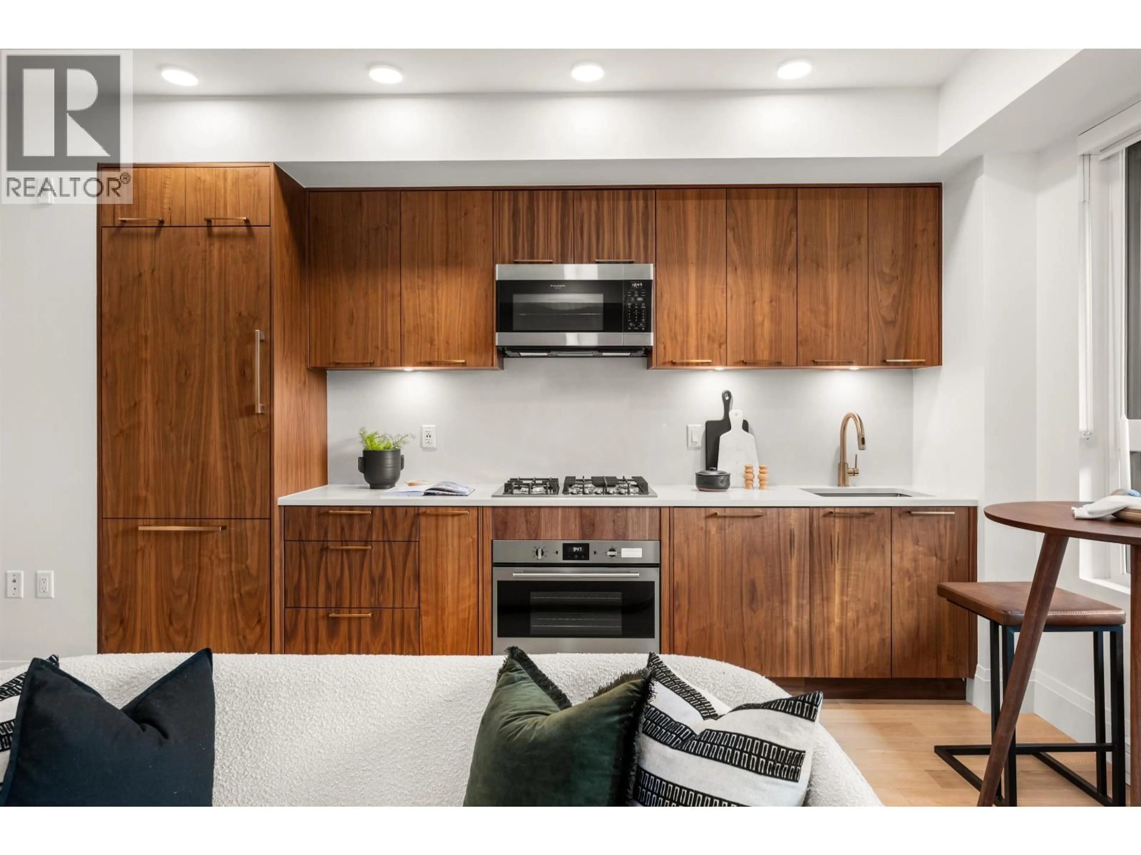 Open concept kitchen, unknown for 106 - 2550 GARDEN DRIVE, Vancouver British Columbia V5N4X6