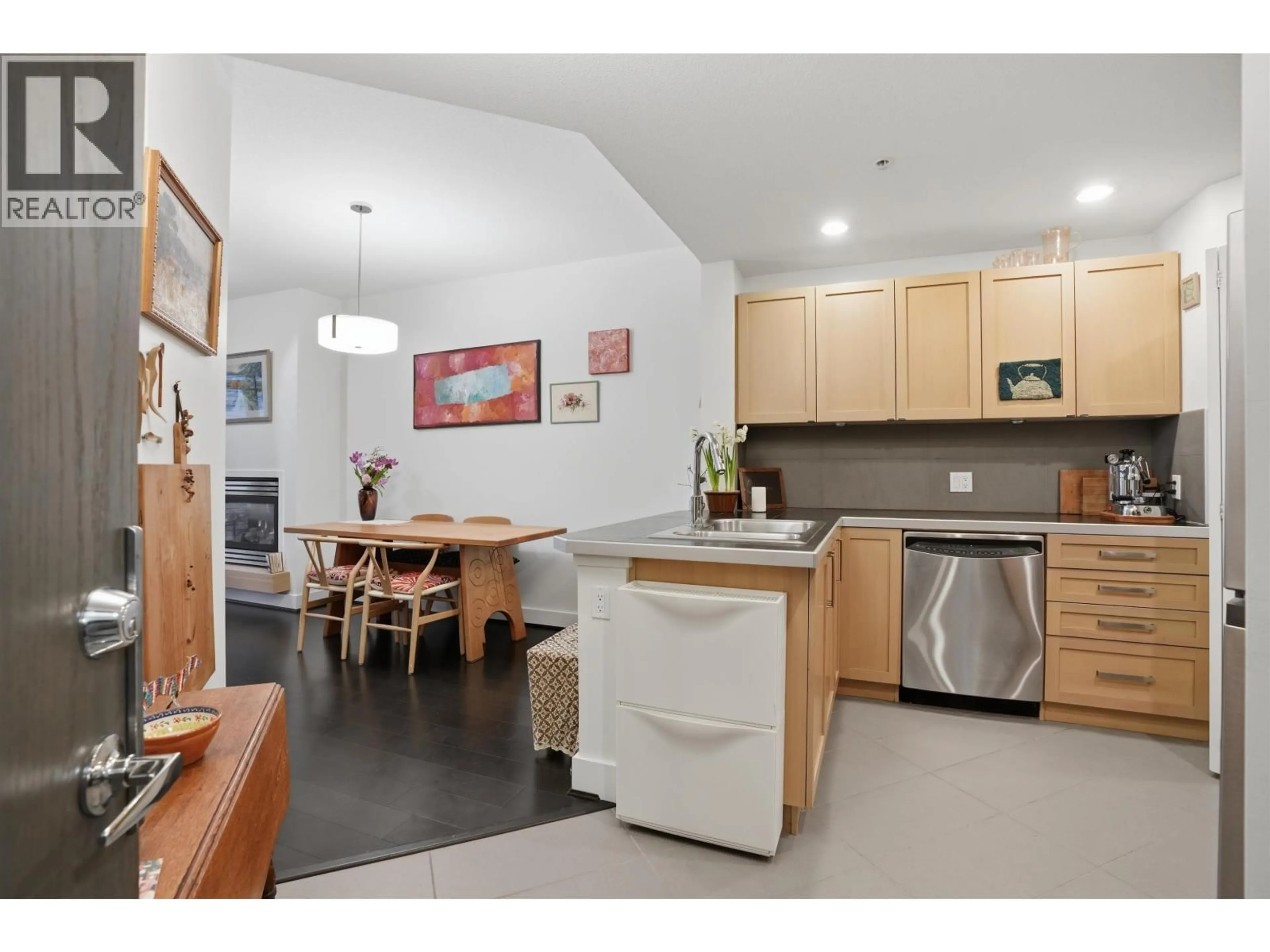 Open concept kitchen, wood/laminate floor for 303 - 5779 BIRNEY AVENUE, Vancouver British Columbia V6S0A3