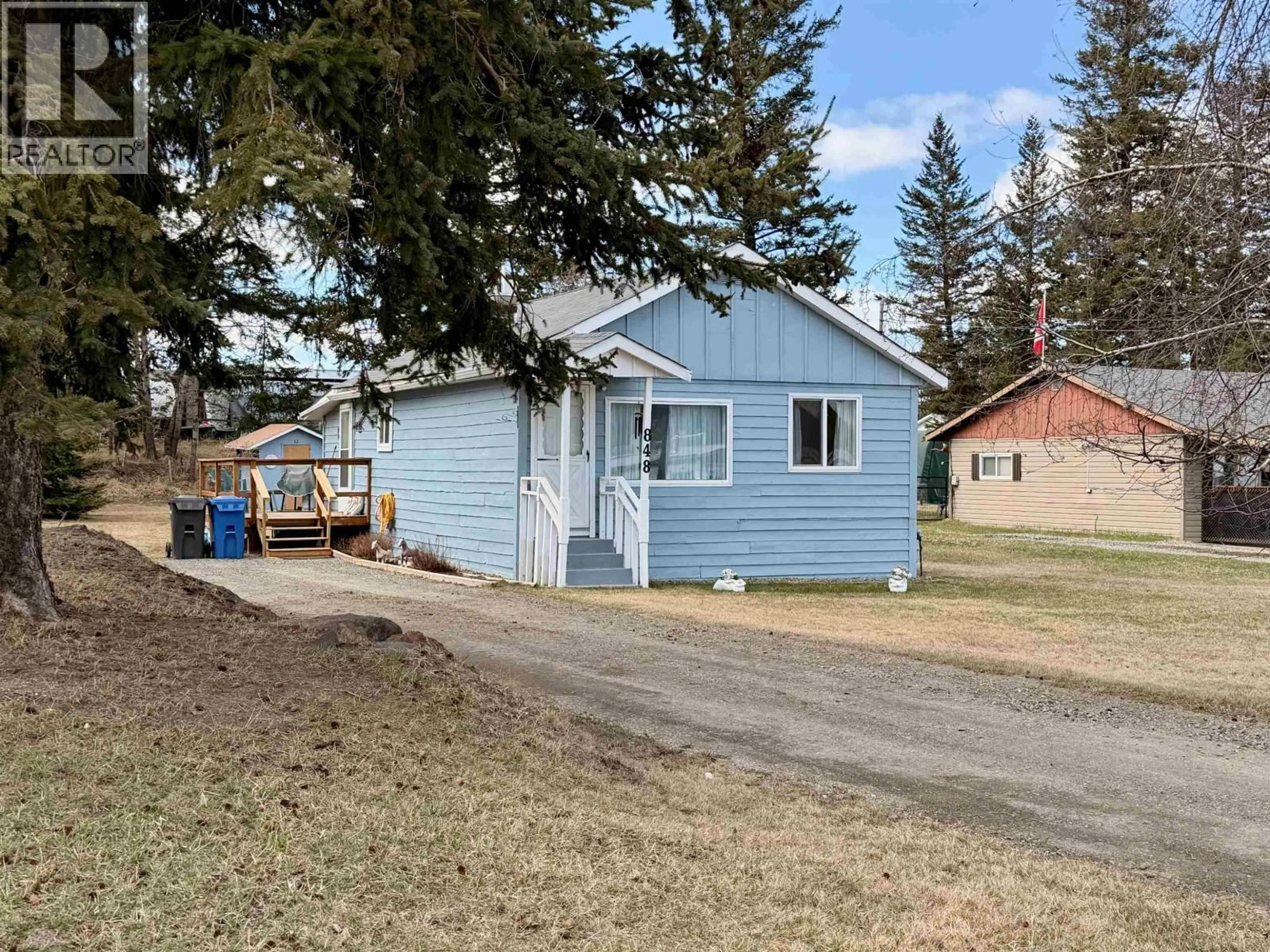 A pic from outside/outdoor area/front of a property/back of a property/a pic from drone, street for 858 SCOTT ROAD, 100 Mile House British Columbia V0K2E0