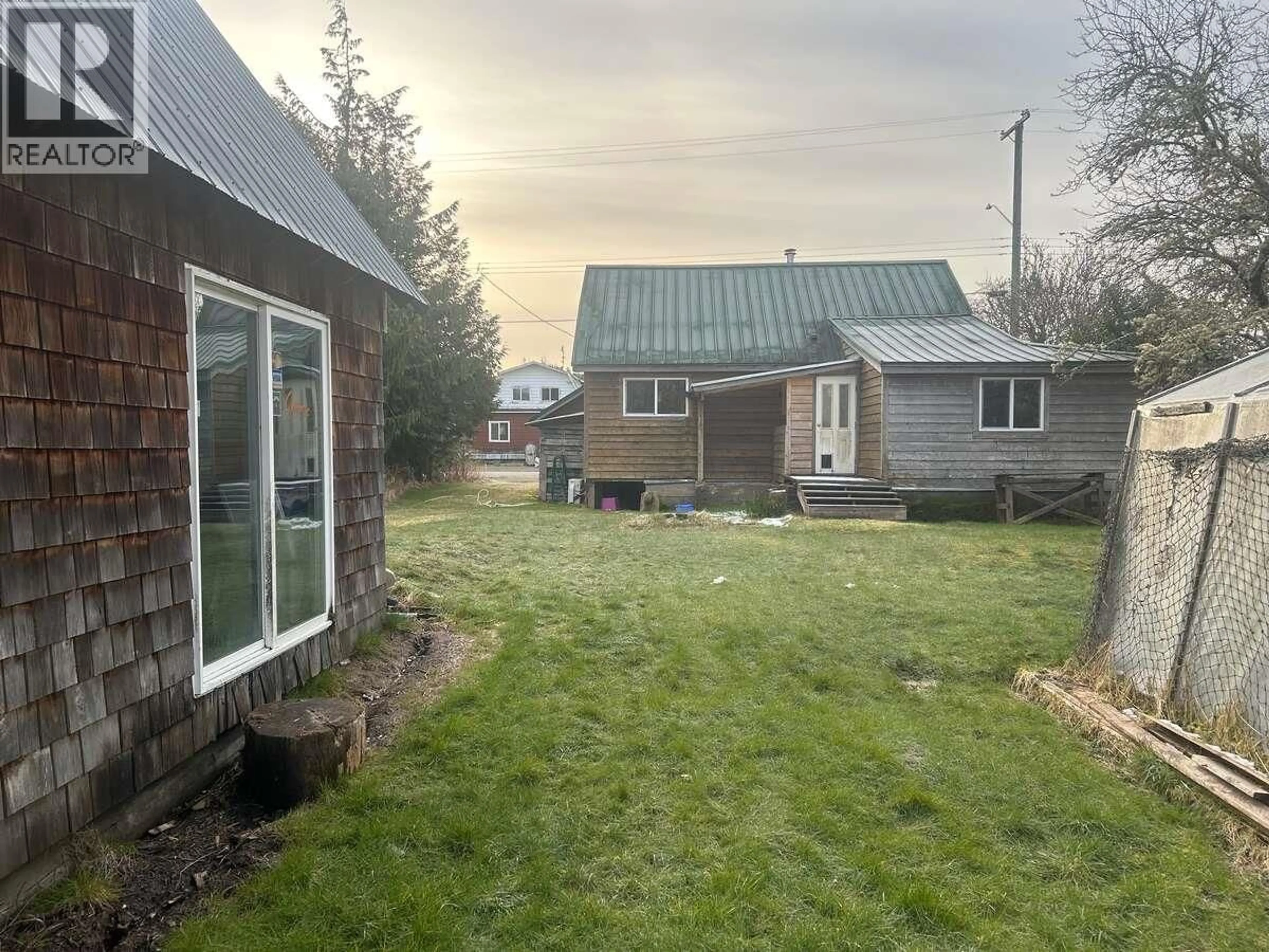 A pic from outside/outdoor area/front of a property/back of a property/a pic from drone, unknown for 1567 DELKATLA STREET, Masset British Columbia V0T1M0