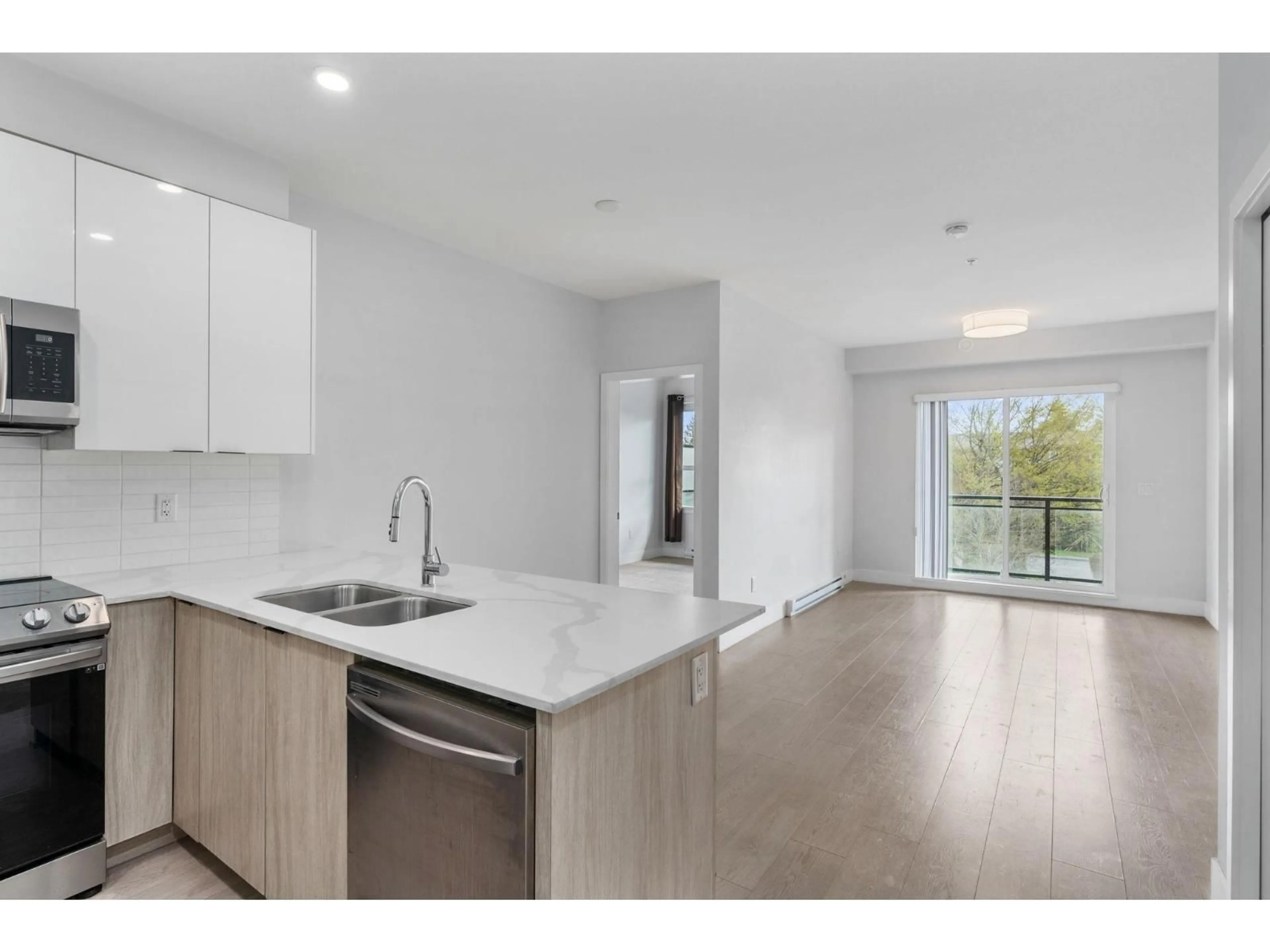 Open concept kitchen, unknown for 309 - 5486 199A STREET, Langley British Columbia V3A0N6