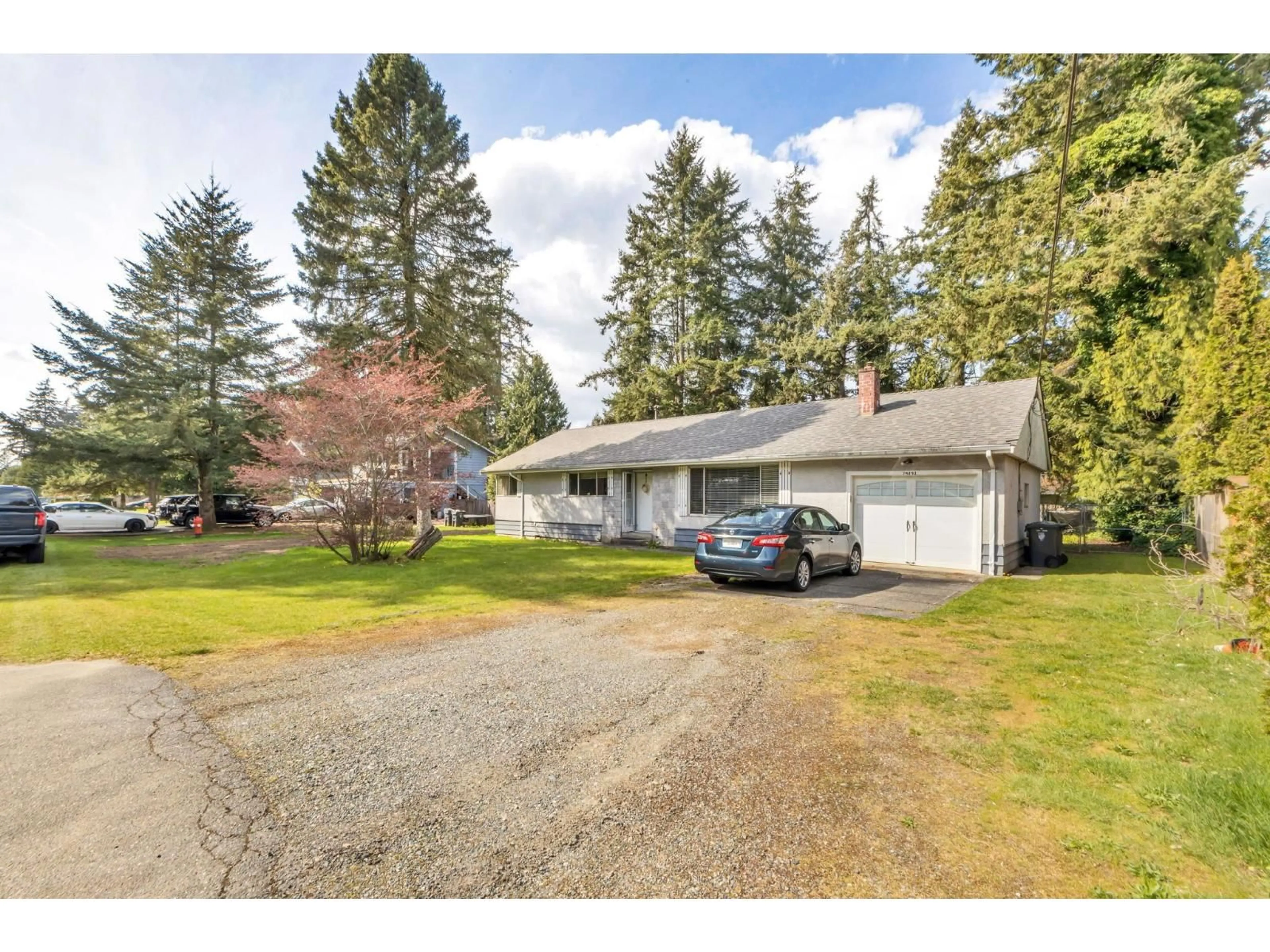 A pic from outside/outdoor area/front of a property/back of a property/a pic from drone, street for 19893 37A AVENUE, Langley British Columbia V3A2S8