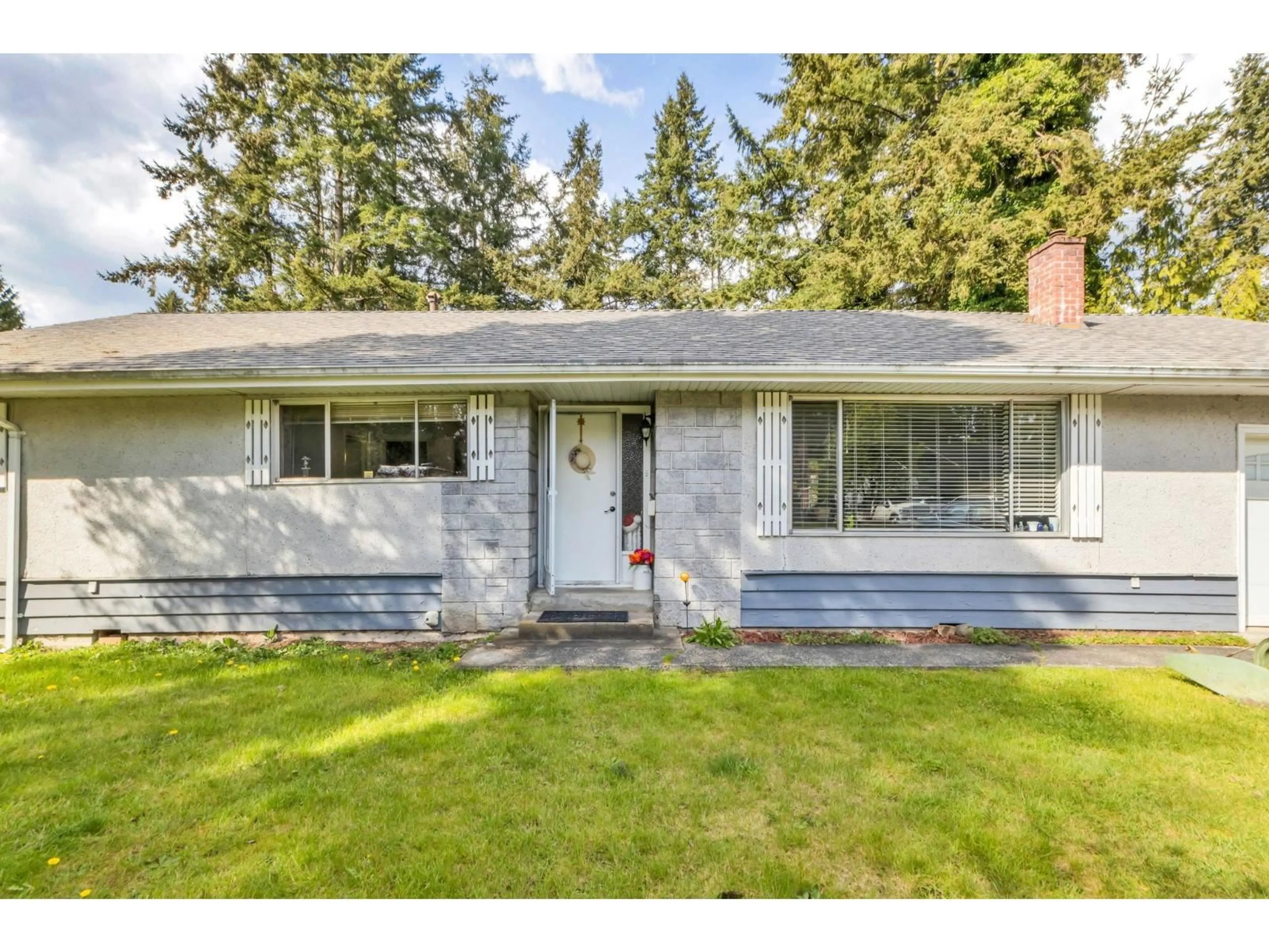 Home with vinyl exterior material, street for 19893 37A AVENUE, Langley British Columbia V3A2S8