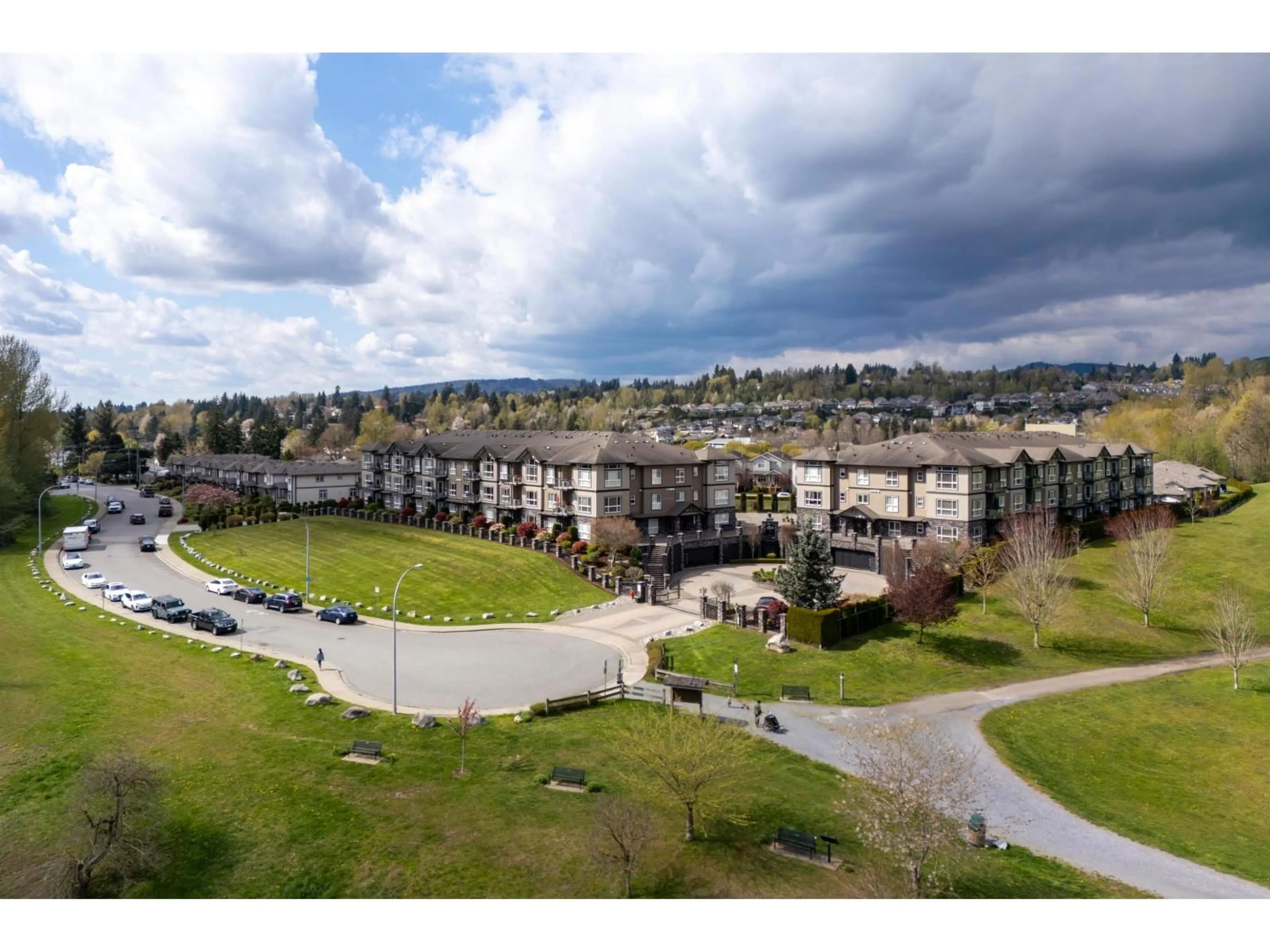 A pic from outside/outdoor area/front of a property/back of a property/a pic from drone, mountain view for A119 - 33755 7 AVENUE, Mission British Columbia V2V0A4