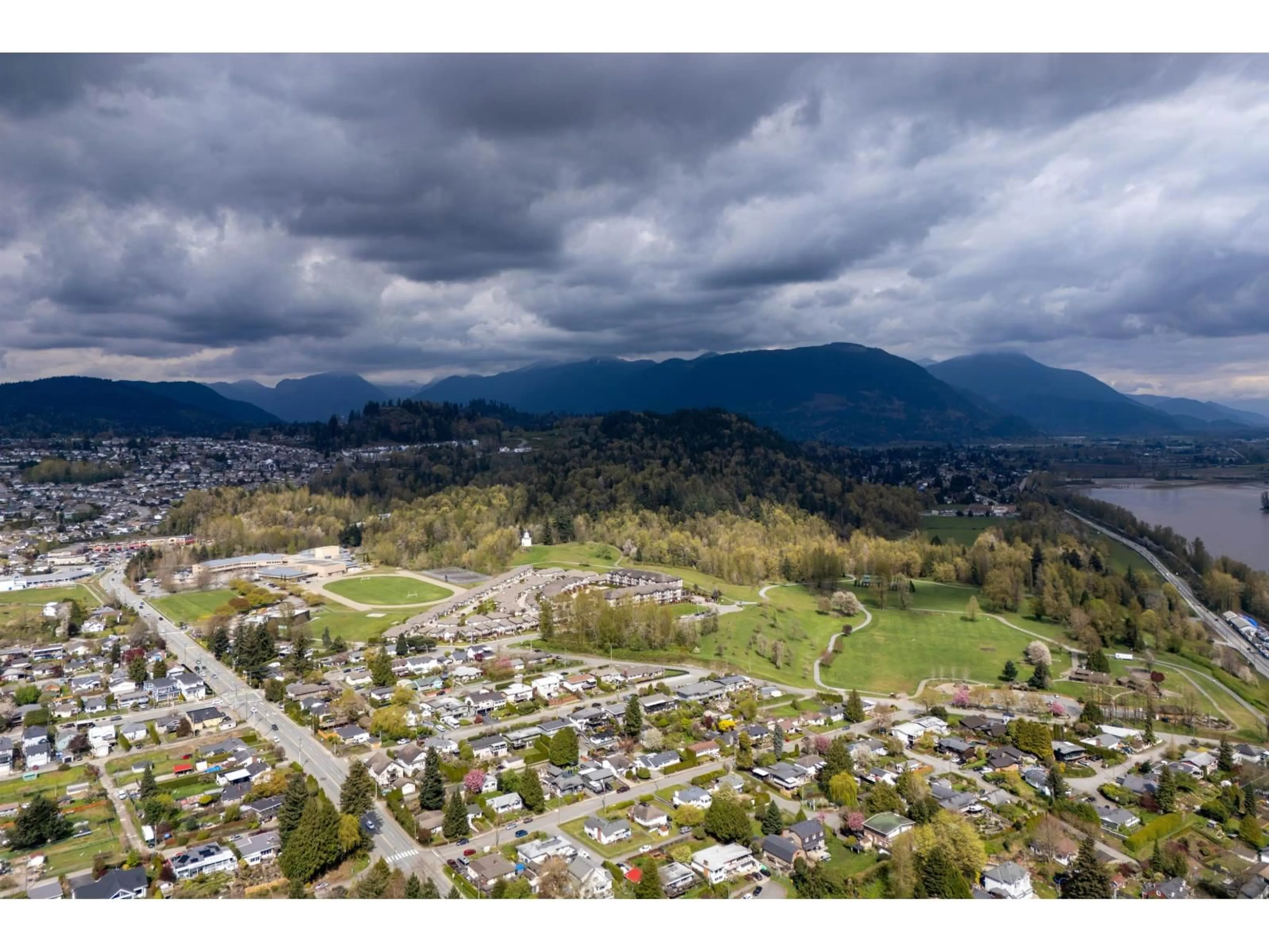 A pic from outside/outdoor area/front of a property/back of a property/a pic from drone, mountain view for A119 - 33755 7 AVENUE, Mission British Columbia V2V0A4