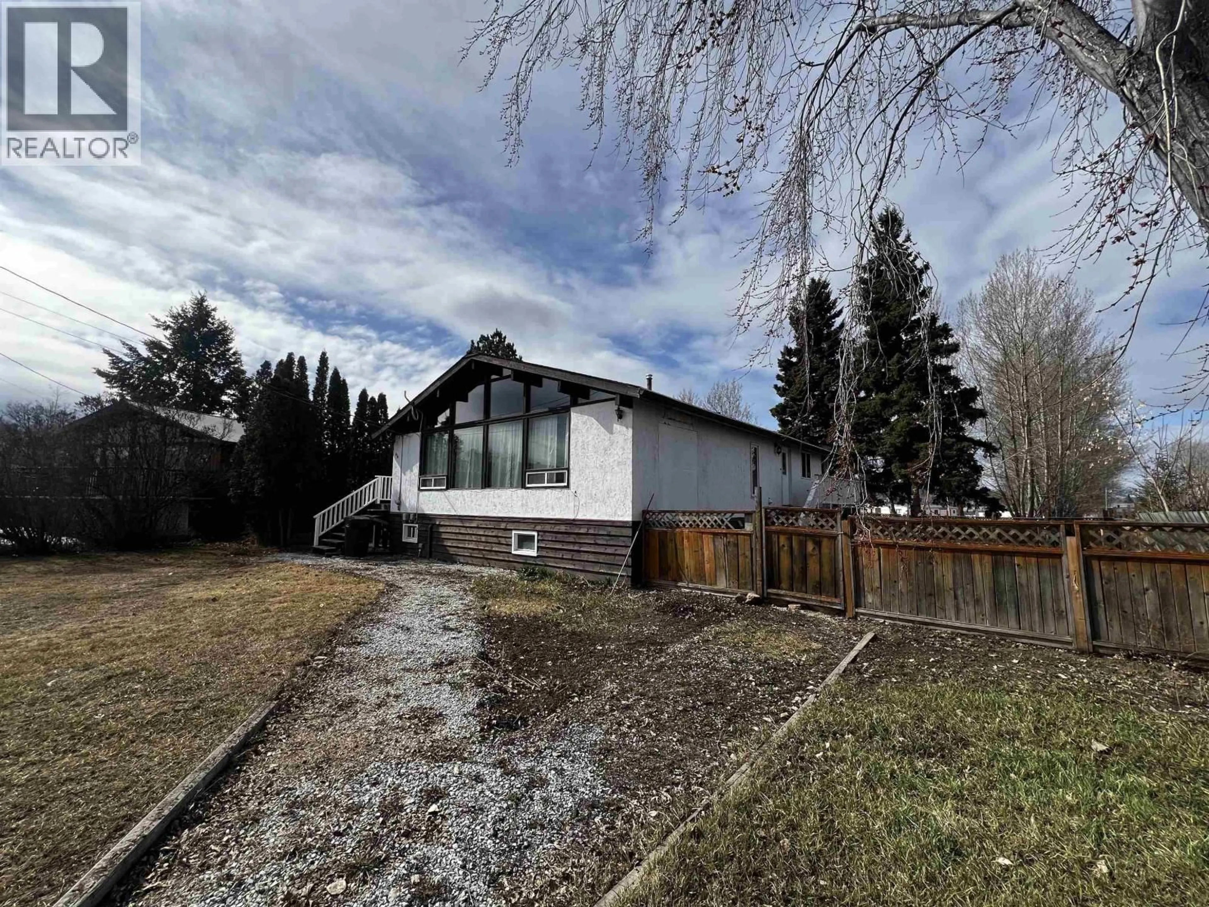 A pic from outside/outdoor area/front of a property/back of a property/a pic from drone, unknown for 414 ENDAKO PLACE, Fraser Lake British Columbia V0J1S0