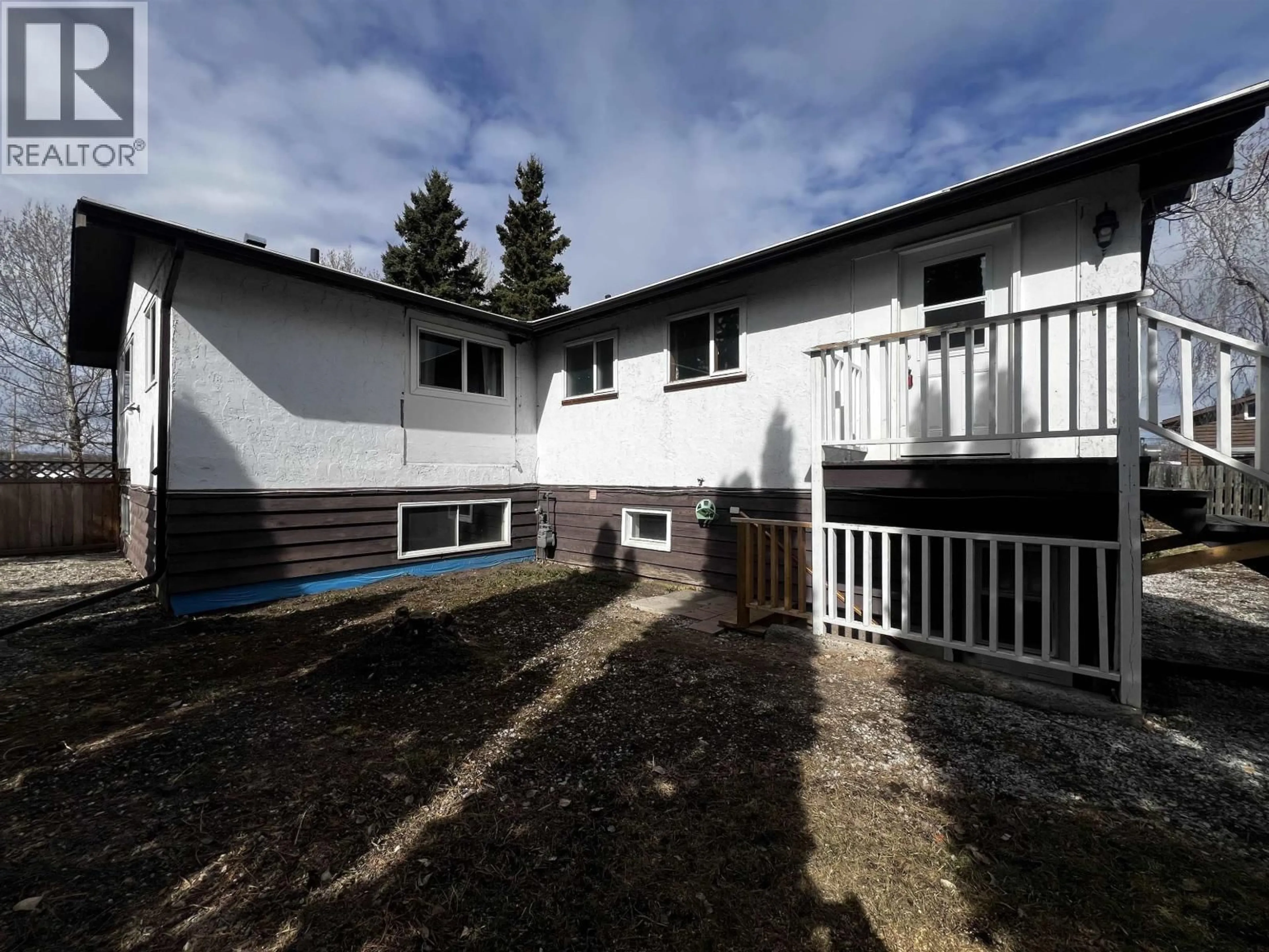 A pic from outside/outdoor area/front of a property/back of a property/a pic from drone, unknown for 414 ENDAKO PLACE, Fraser Lake British Columbia V0J1S0