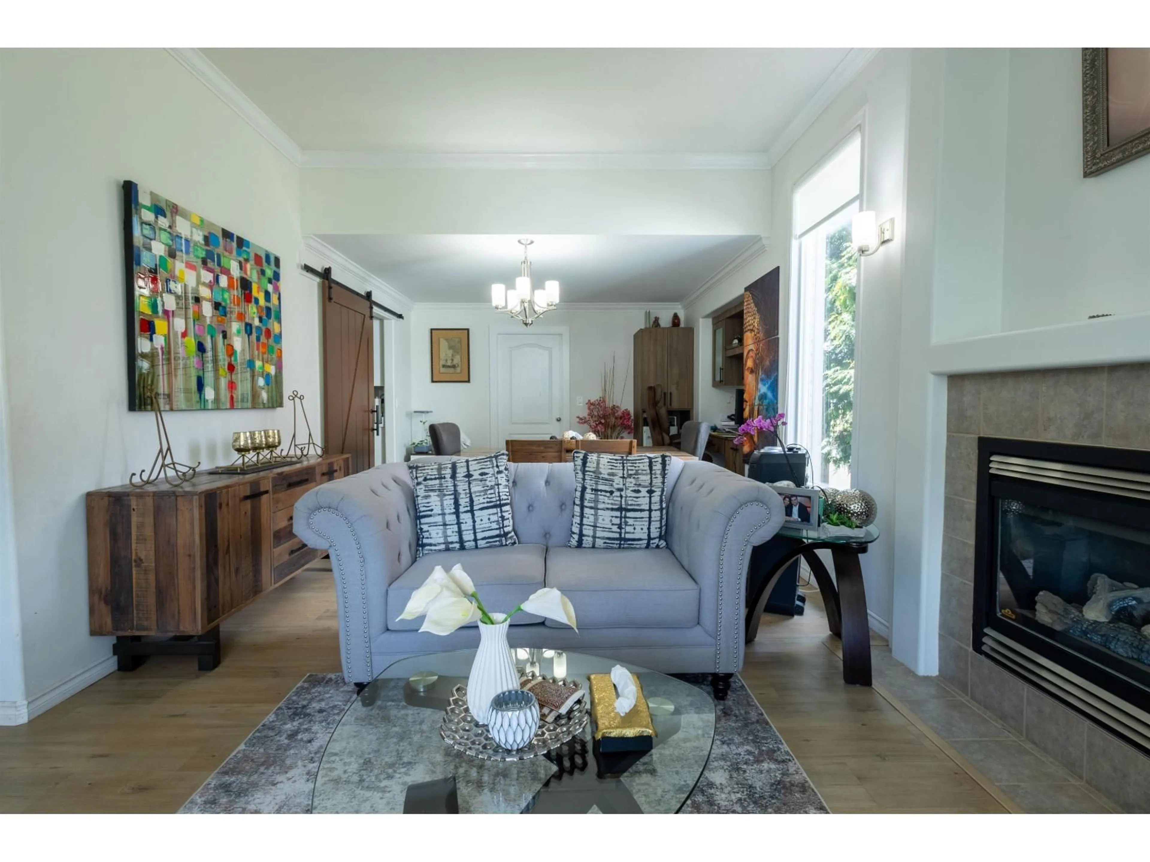 Living room with furniture, wood/laminate floor for 6739 178B STREET, Surrey British Columbia V3S9E1