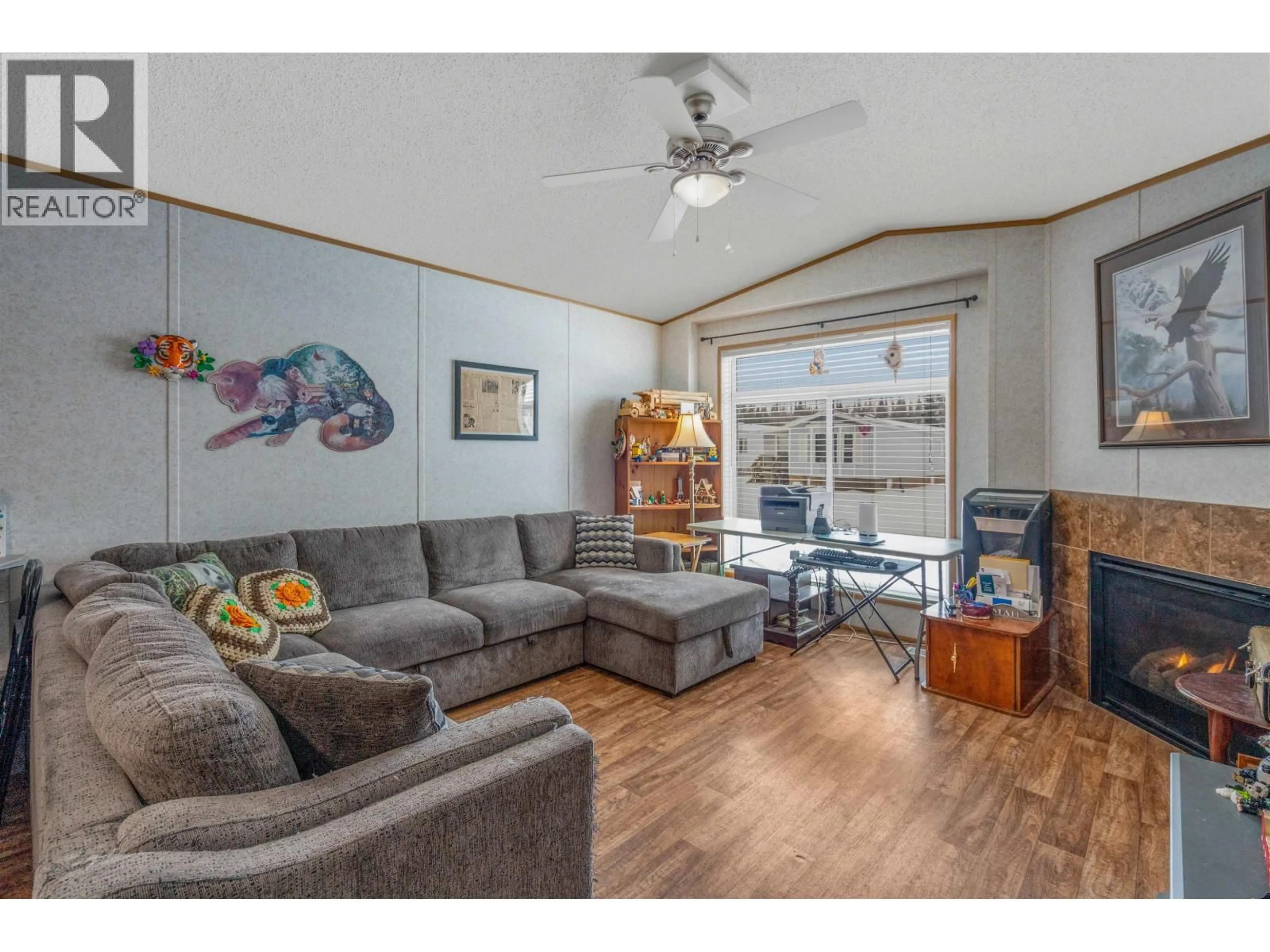 Living room with furniture, wood/laminate floor for 27 - 7817 97 HIGHWAY, Prince George British Columbia V2N6P6