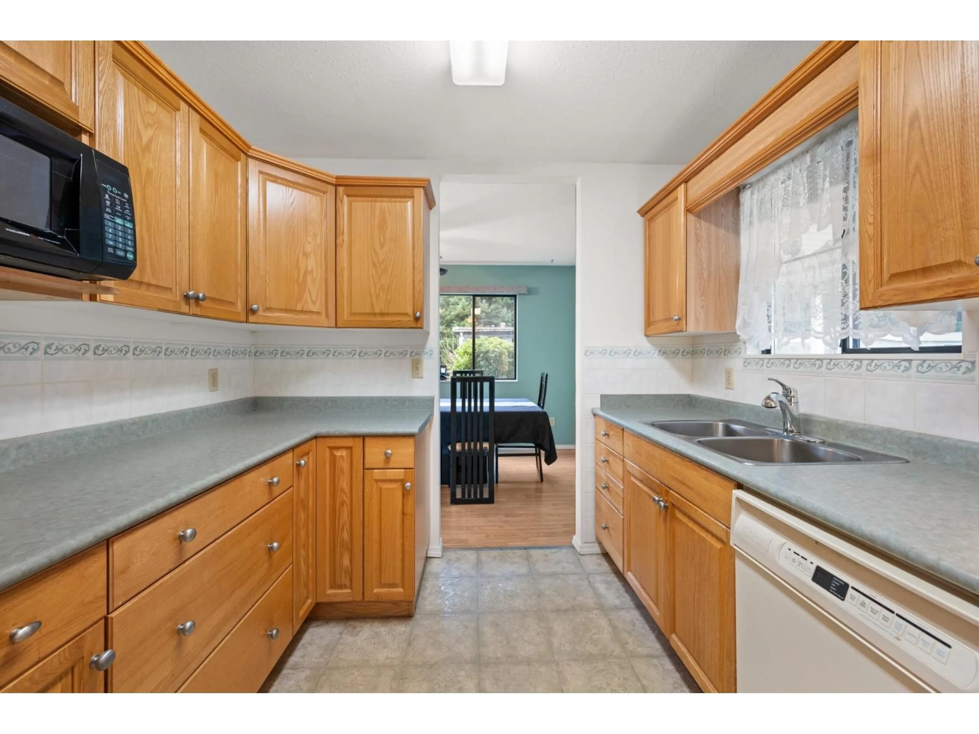 Standard kitchen, ceramic/tile floor for 238 - 27111 0 AVENUE, Langley British Columbia V4W2T3