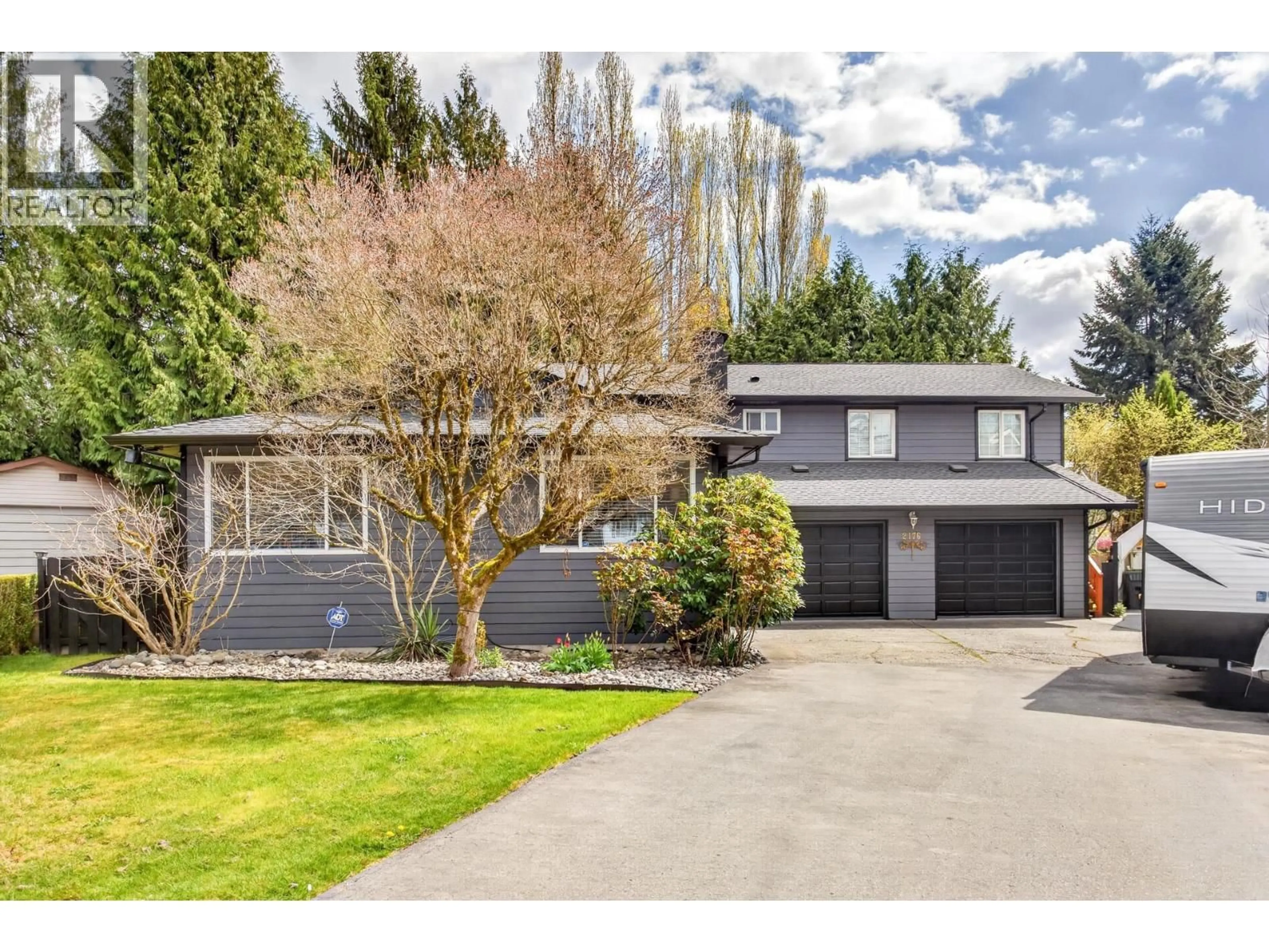 Home with vinyl exterior material, street for 2176 LAURIER AVENUE, Port Coquitlam British Columbia V3B5N7